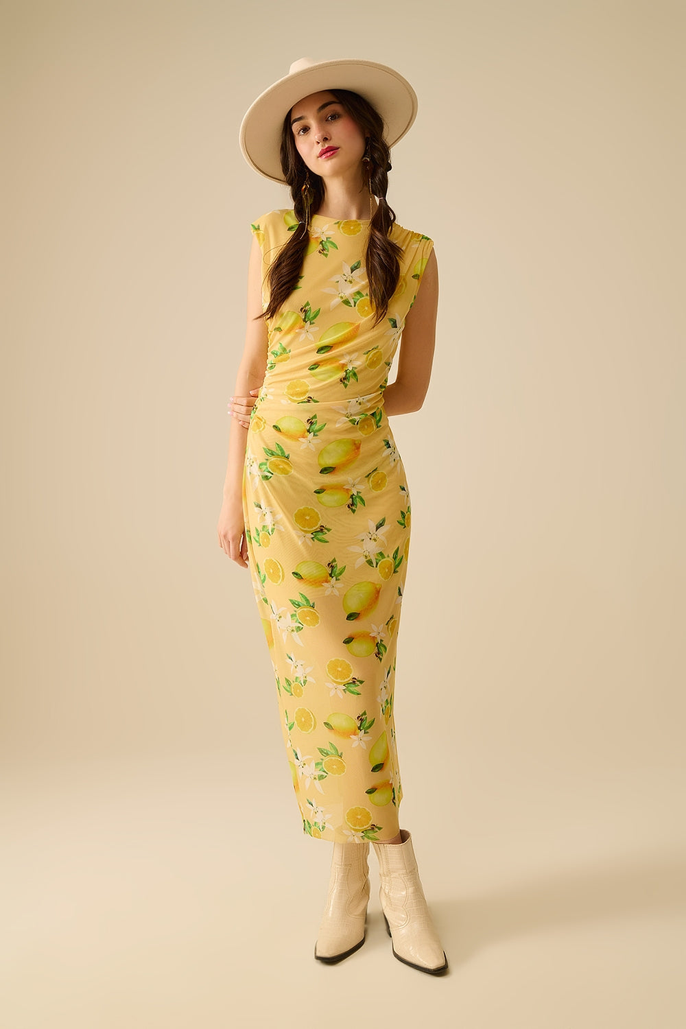 Abito in tulle con balza laterale con stampa giallo limone