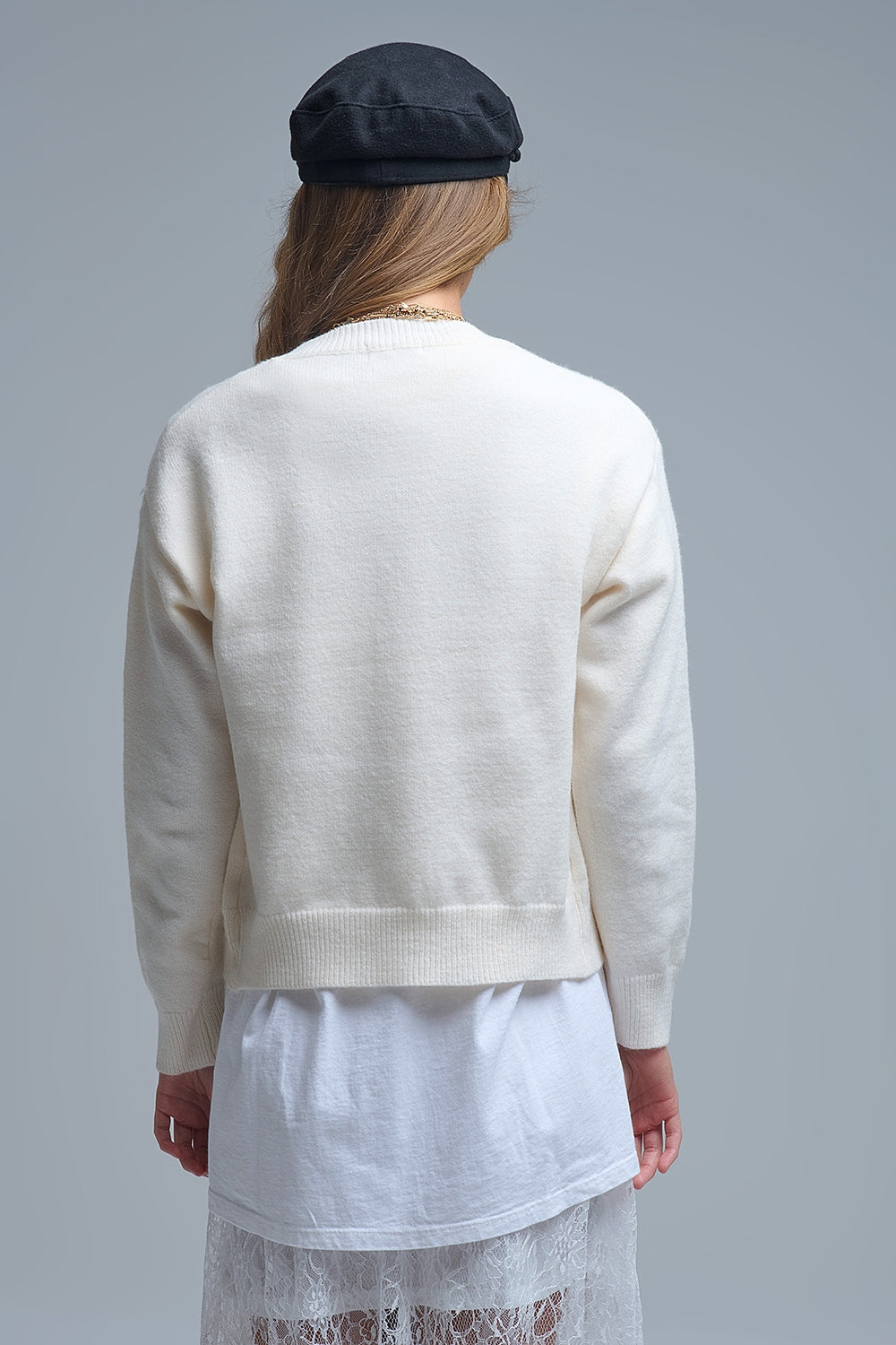 Accogliente cardigan bianco con cuori rossi