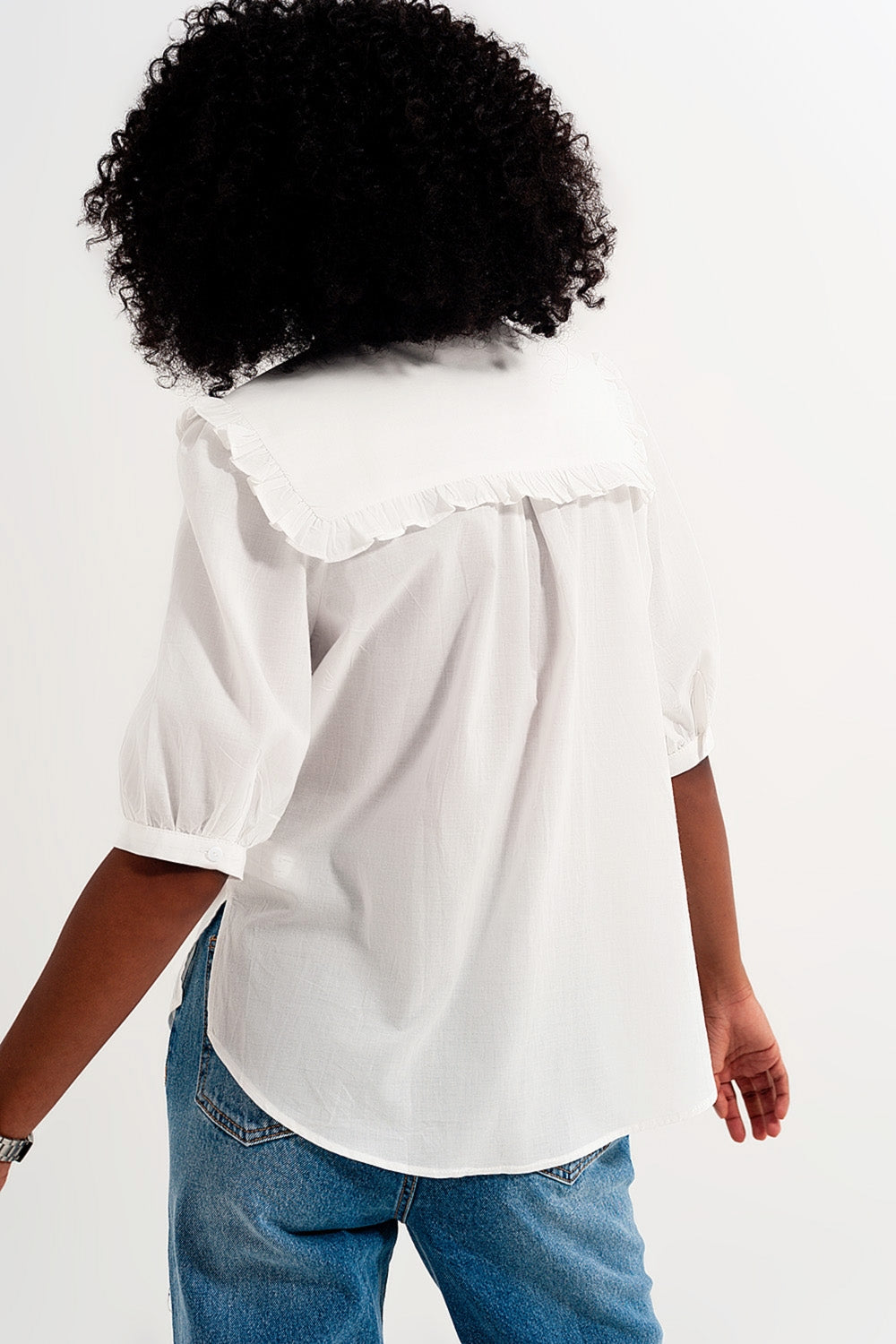 Blusa bianca con colletto western