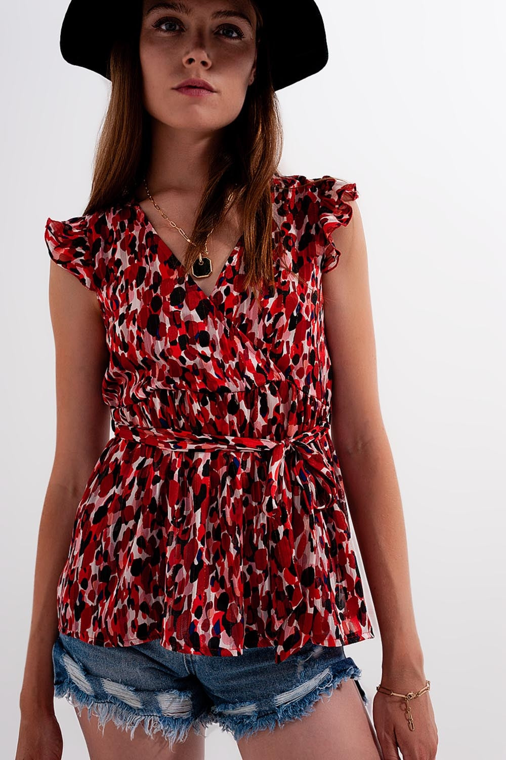 Blusa chiffon con volant animalier