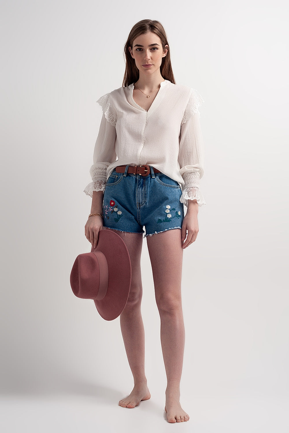Blusa con maniche voluminose con polsini color ostrica