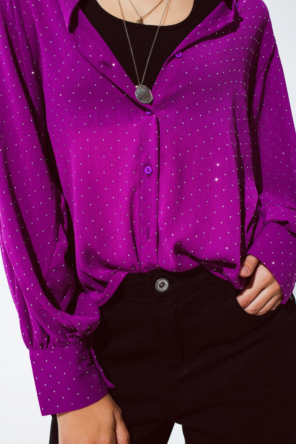 Blusa in magenta con dettagli strass