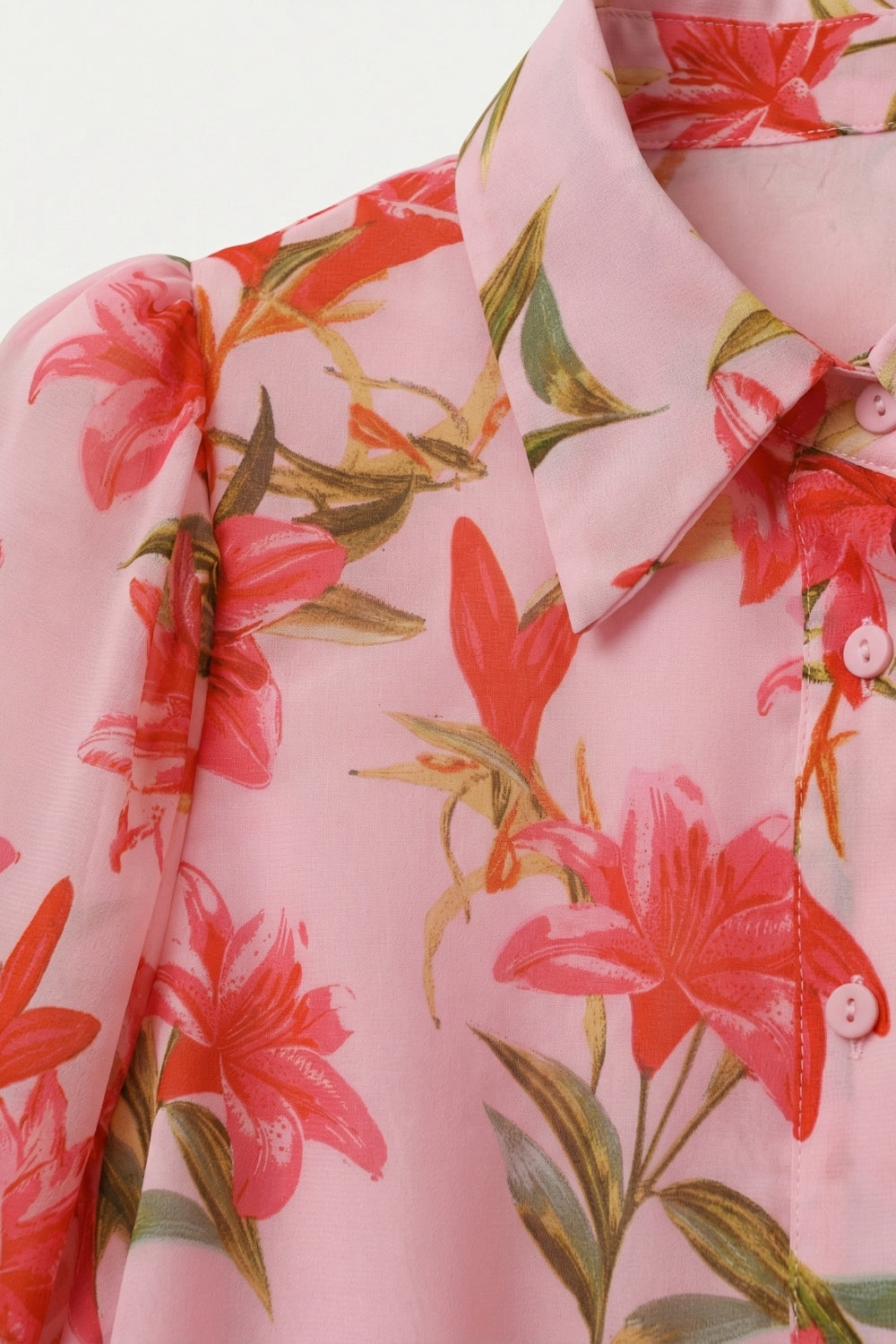 Blusa rosa con stampa floreale e bottoni maniche a palloncino in chiffon