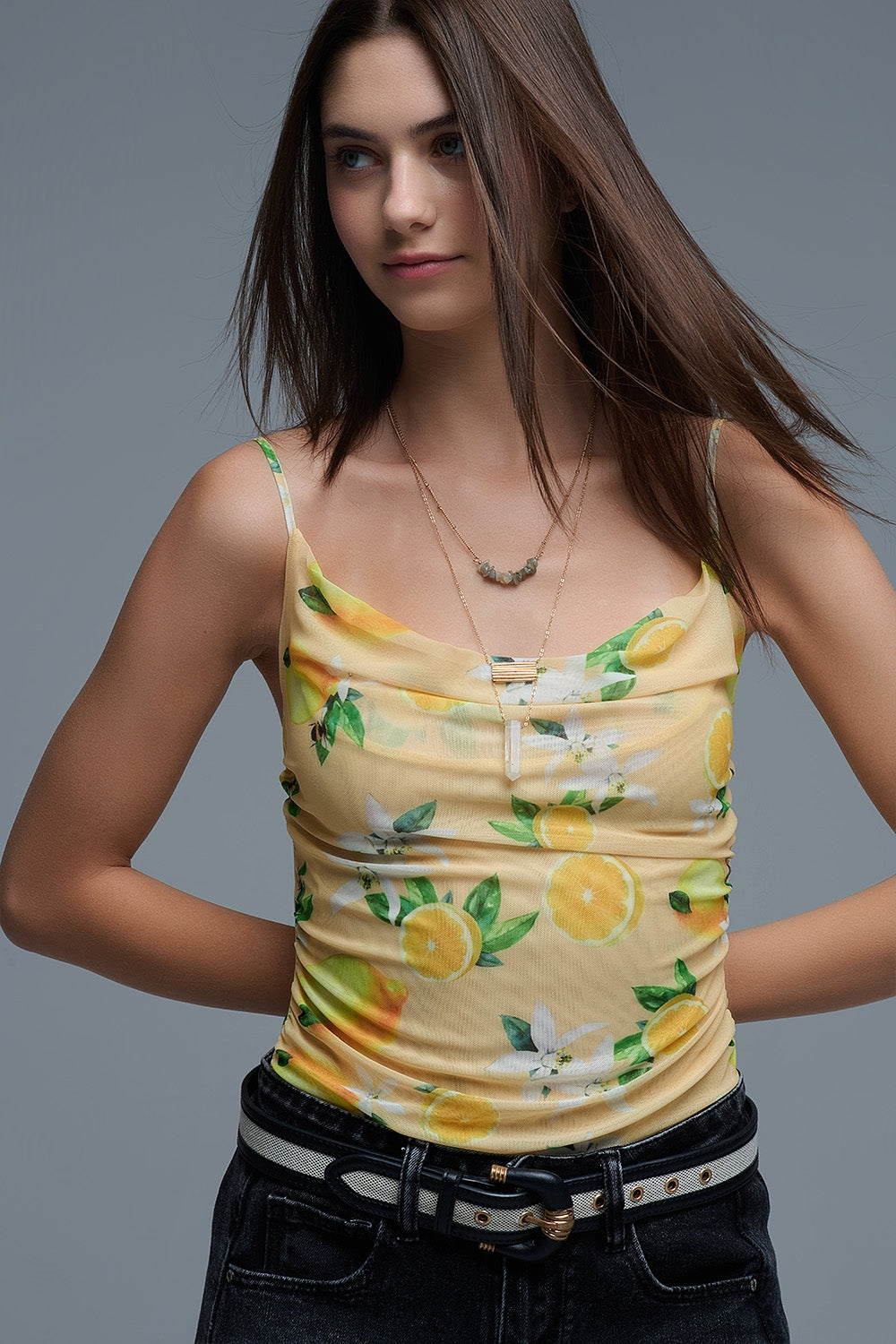 Body top giallo con stampa di limoni in tessuto a rete