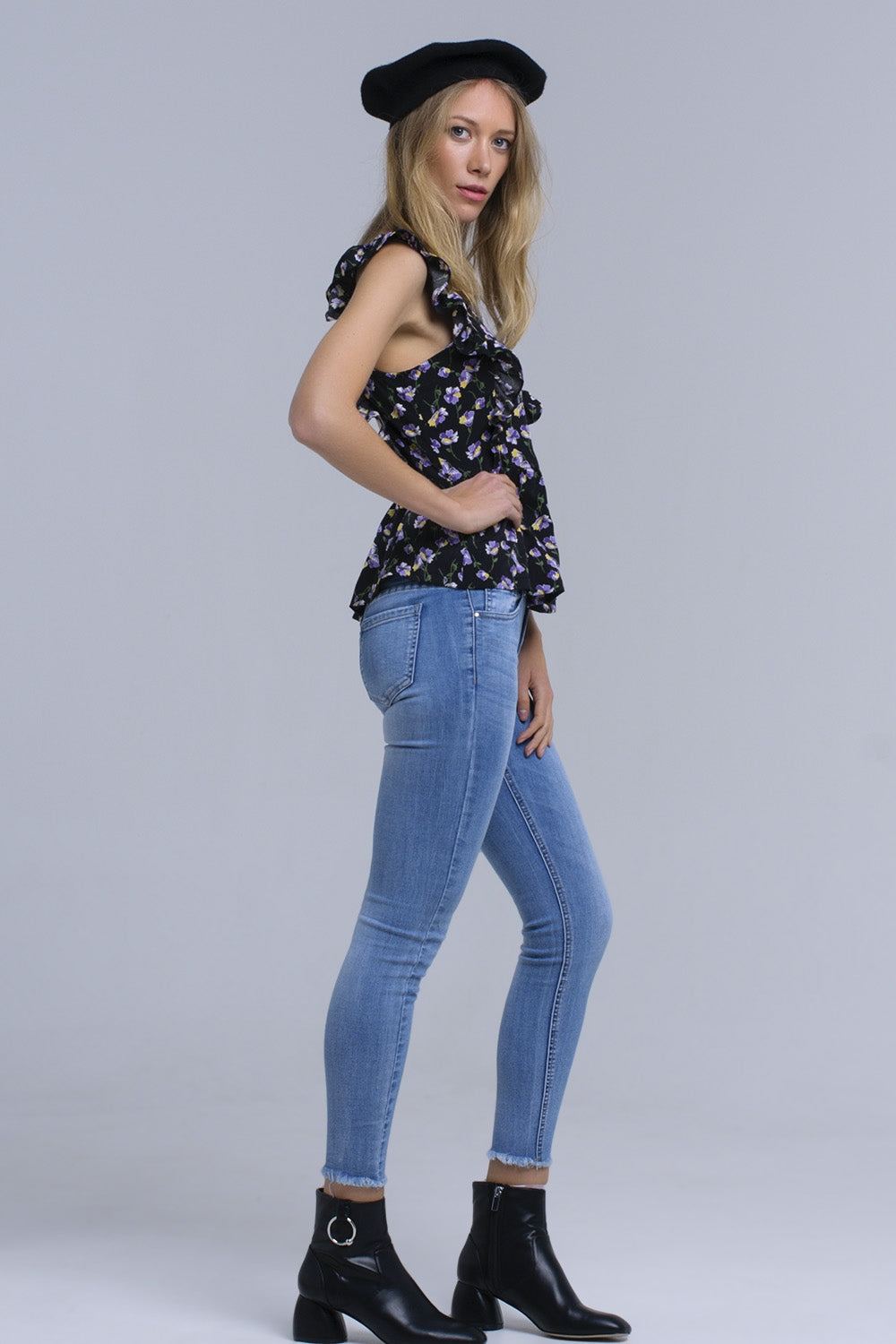 Camicia nera incrociata con volant