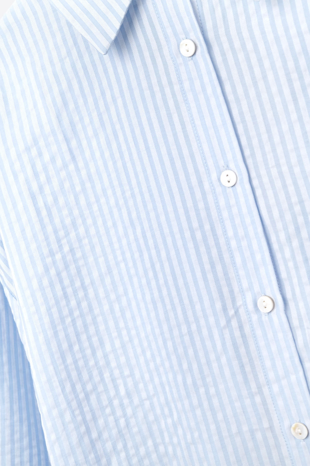 camicia oversize blu baby con fiocco sul retro