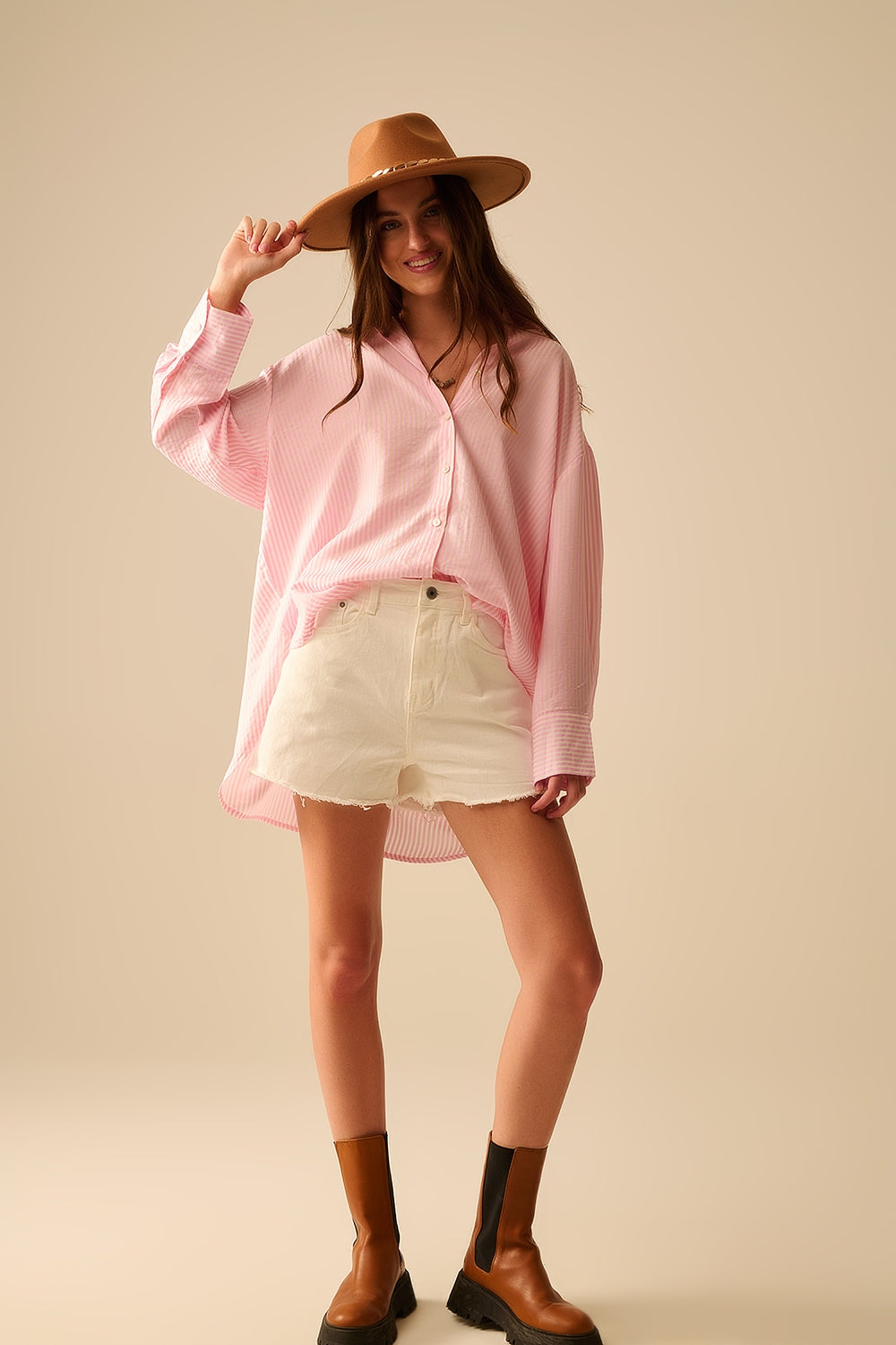 camicia oversize rosa baby con fiocco sul retro