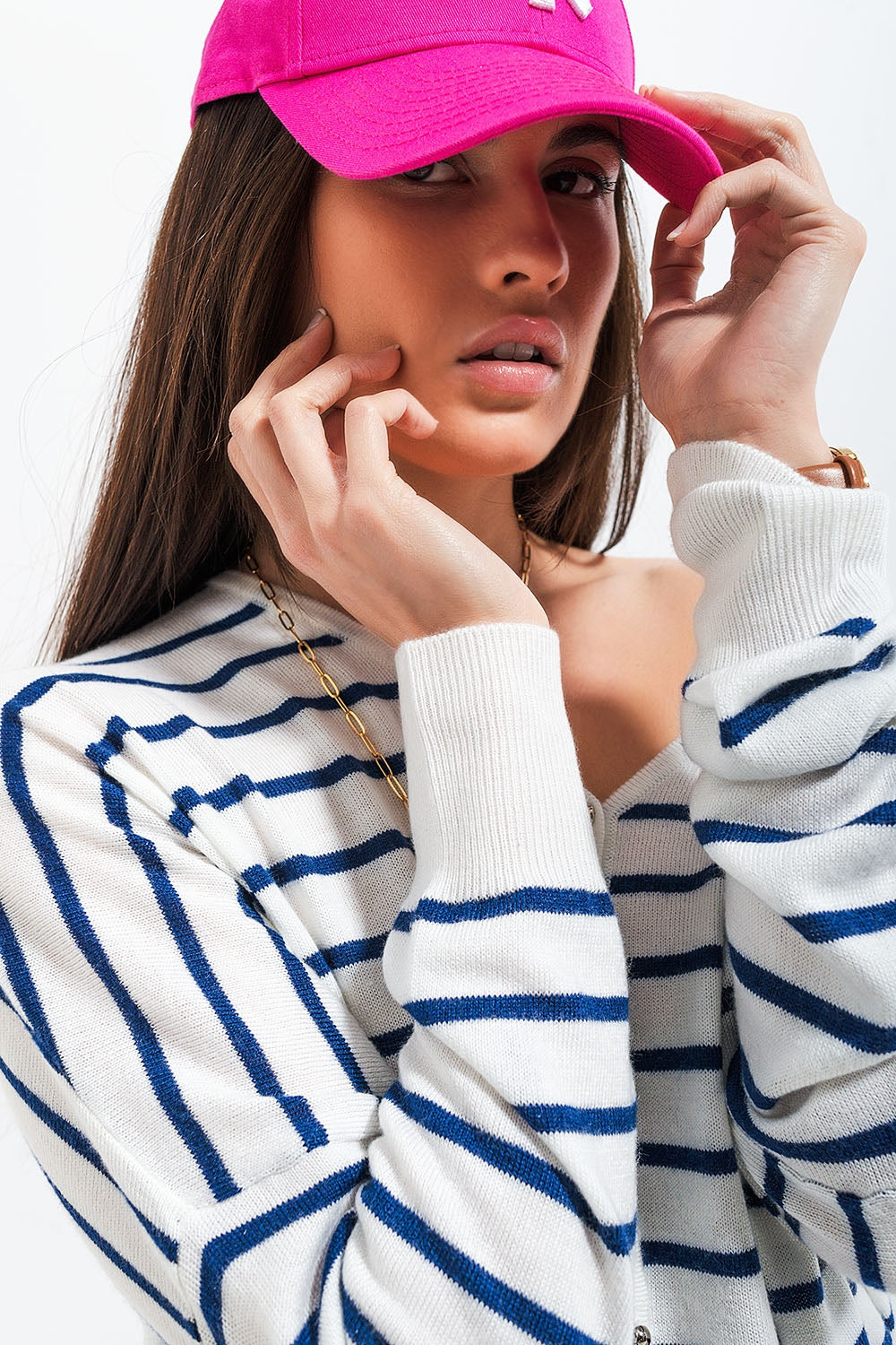 Cardigan a righe color crema con bottoni