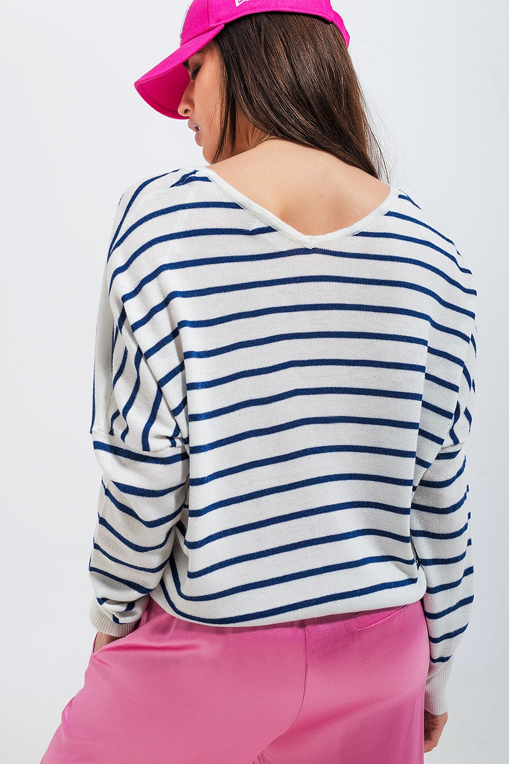 Cardigan a righe color crema con bottoni