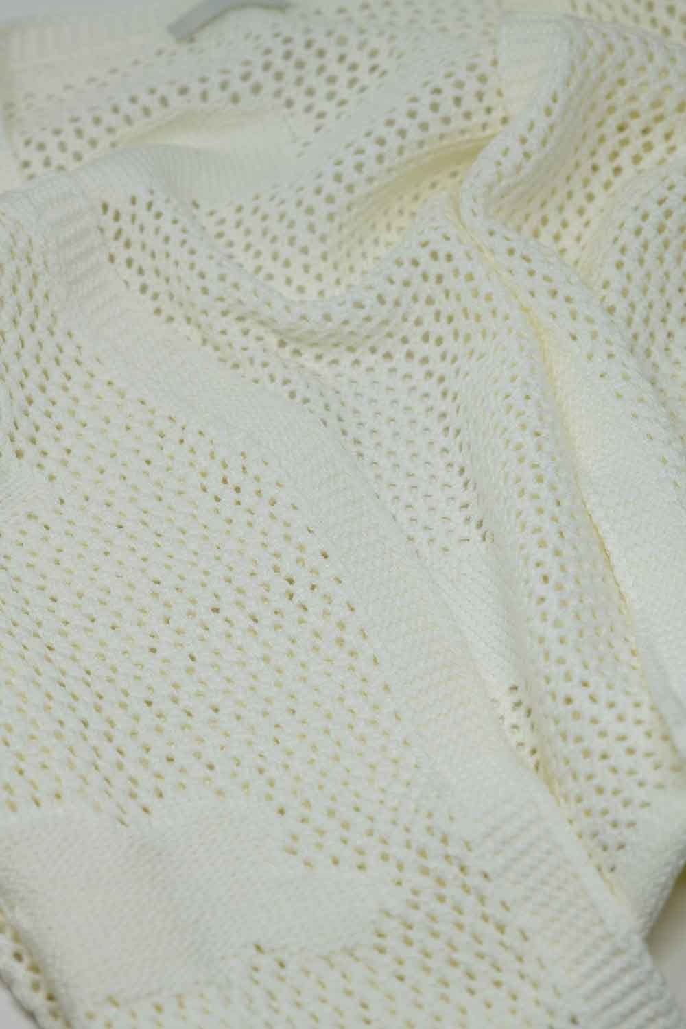 Cardigan all'uncinetto con nuvole lavorate a maglia in bianco