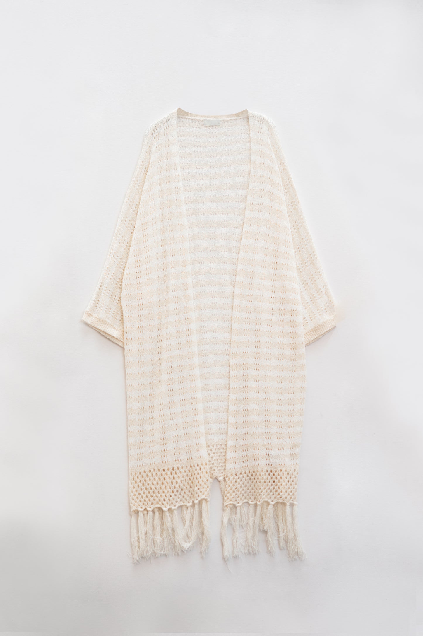 Cardigan crema in stile bohémien con maglia a righe e frange