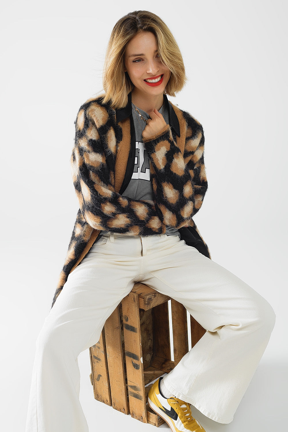 cardigan nero con stampa leopardata in tessuto lavorato a maglia con lana