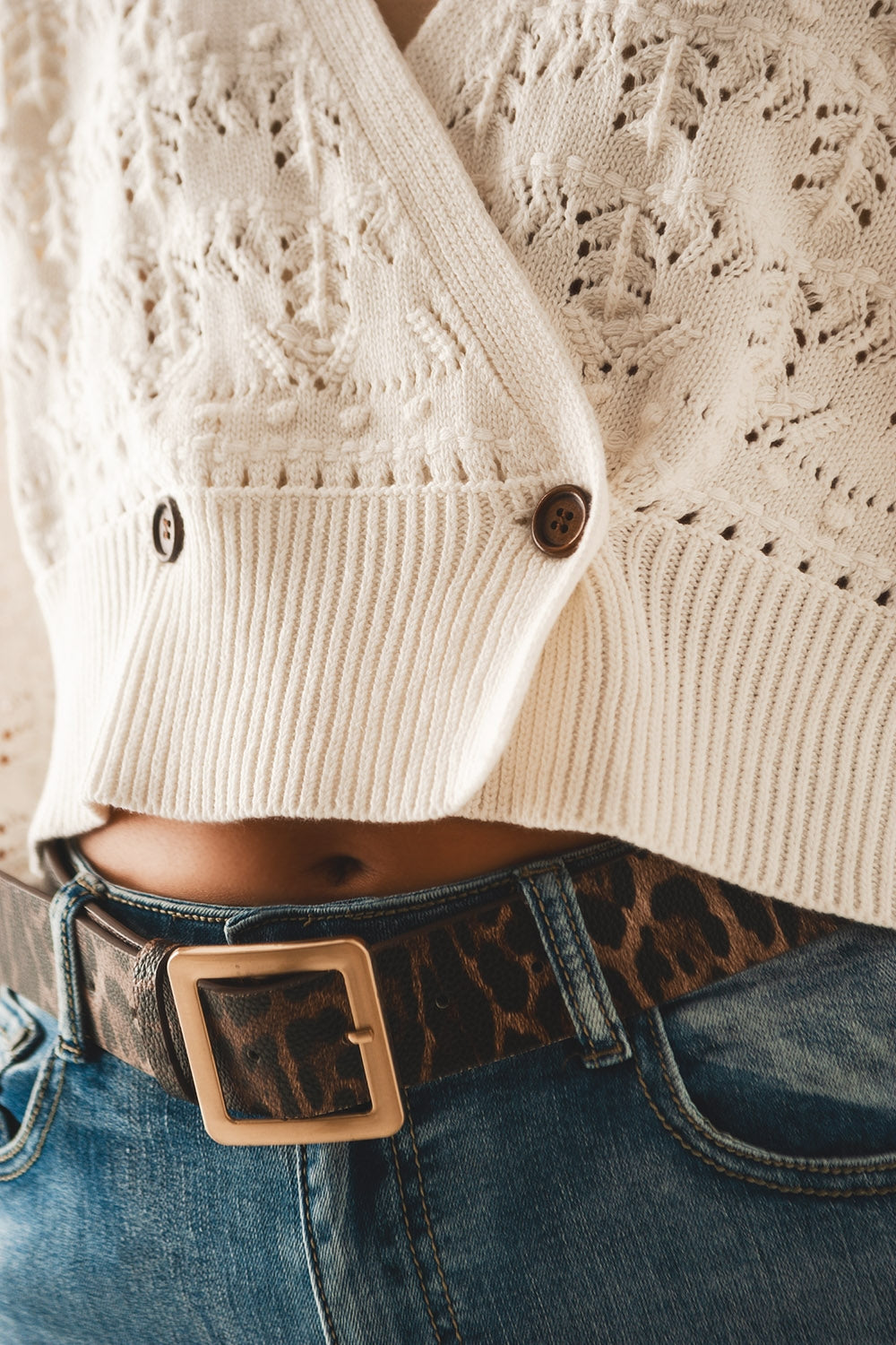 Cardigan traforato in maglia crema