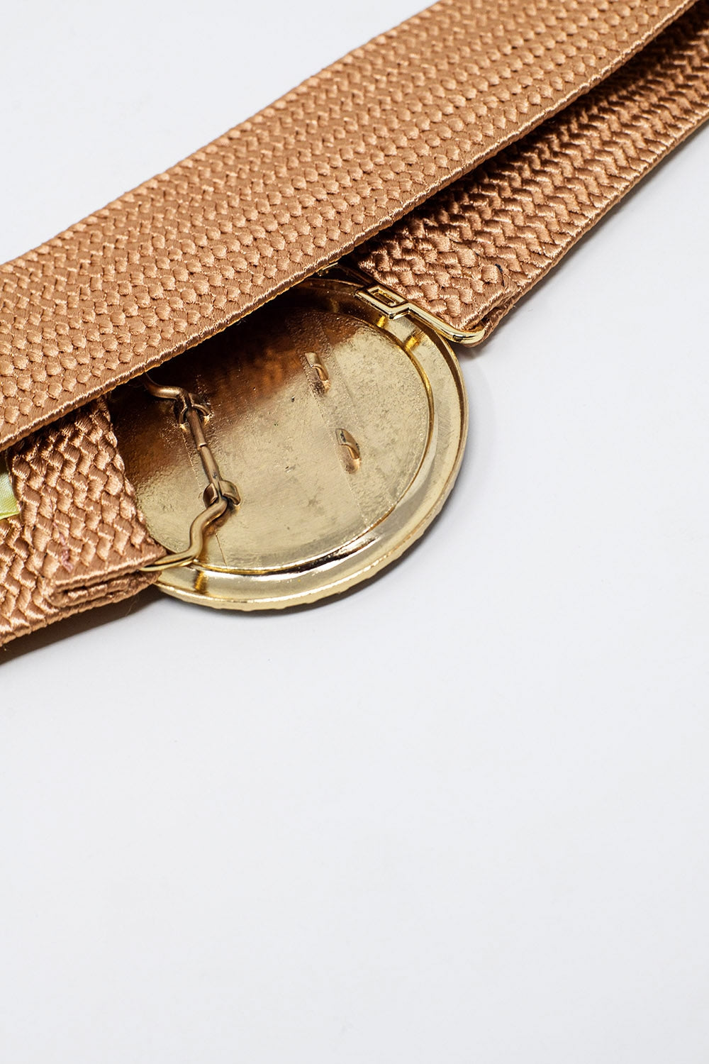 Cintura intrecciata rosa con fibbia rotonda con strass