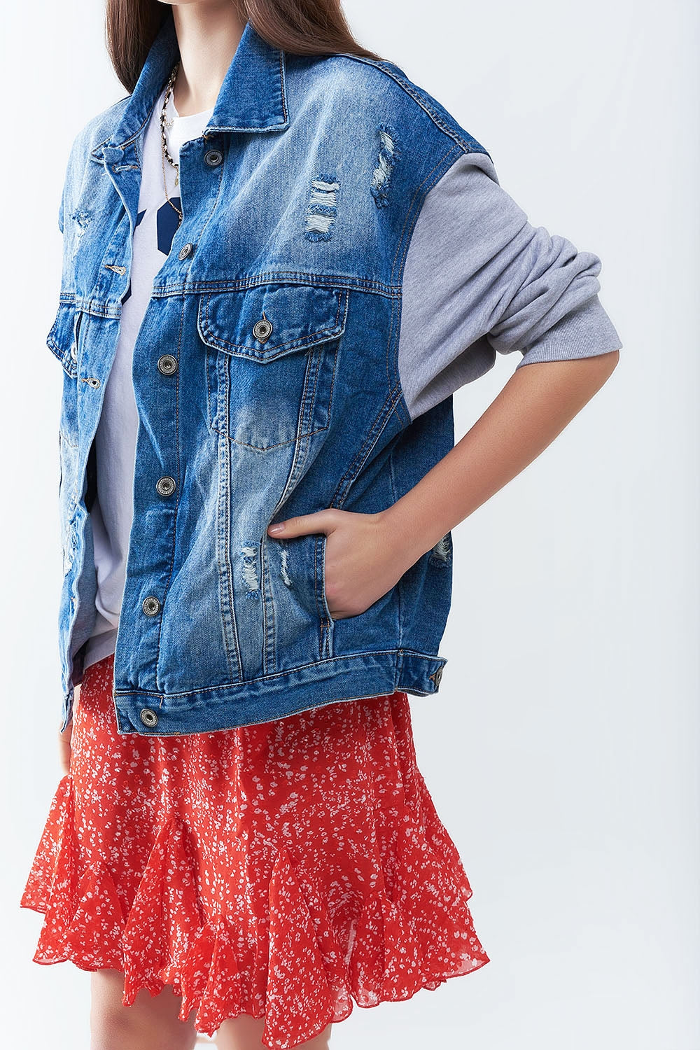Giacca in denim con maniche in tessuto da jogging