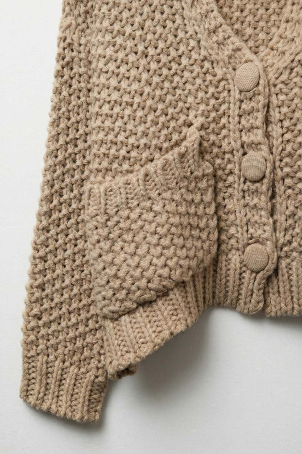 Giacca oversize in maglia grossa con tasche in beige scuro