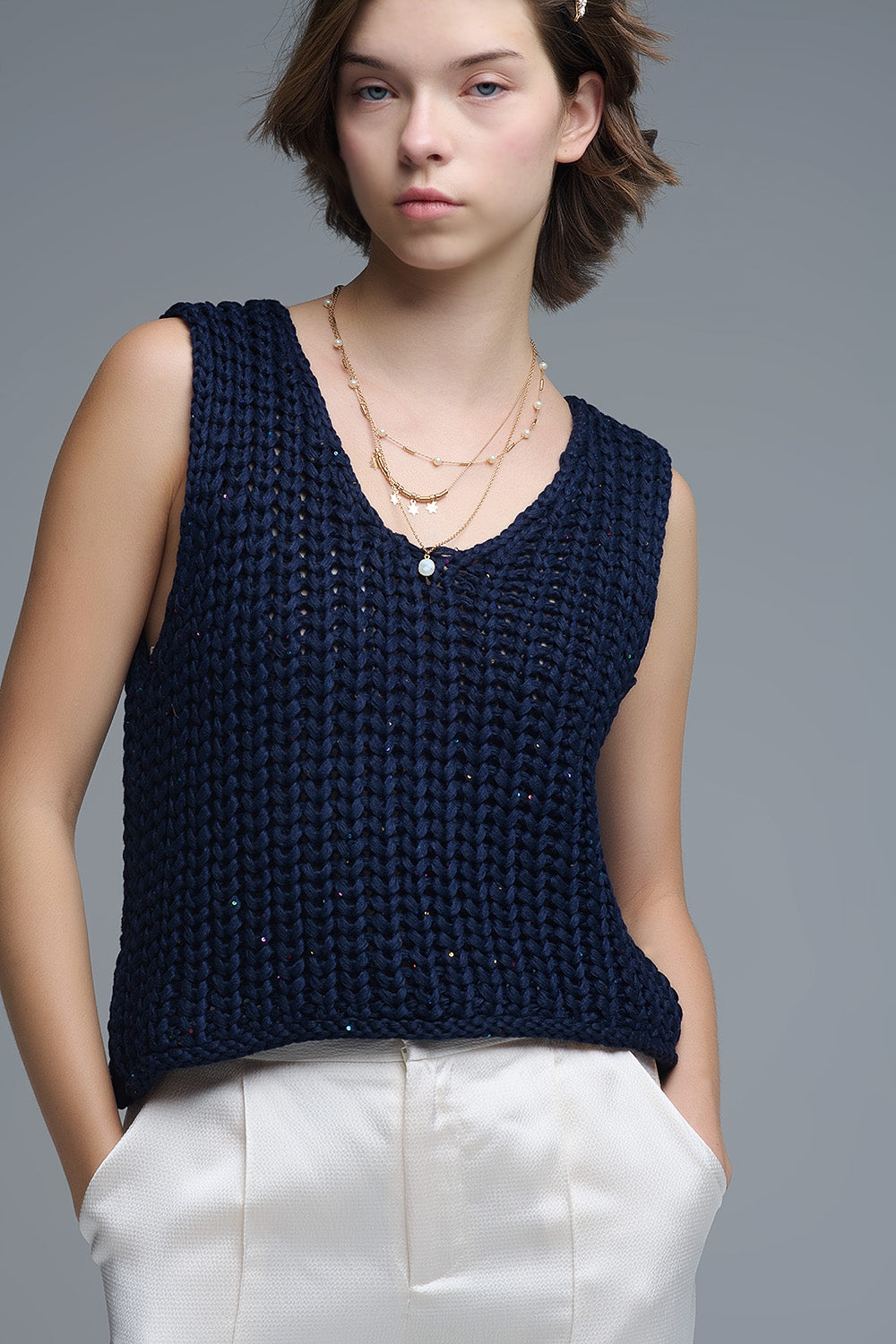 Gilet all'uncinetto in marina con filo di paillettes