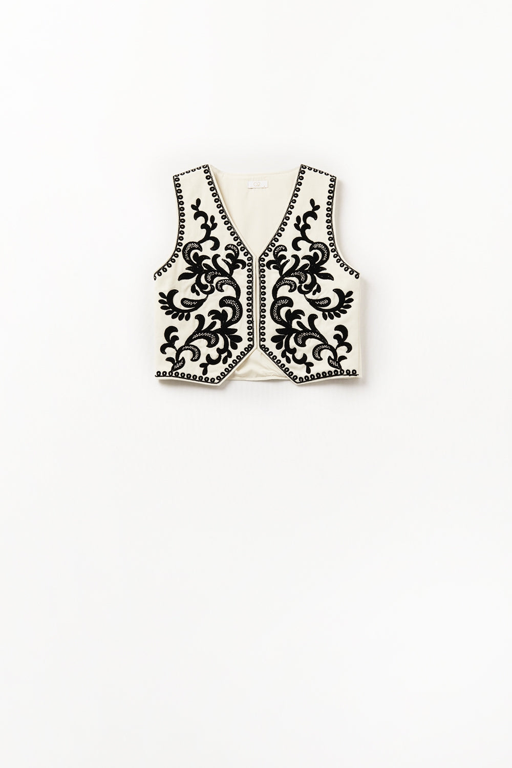 Gilet bianco con ricamo barocco nero
