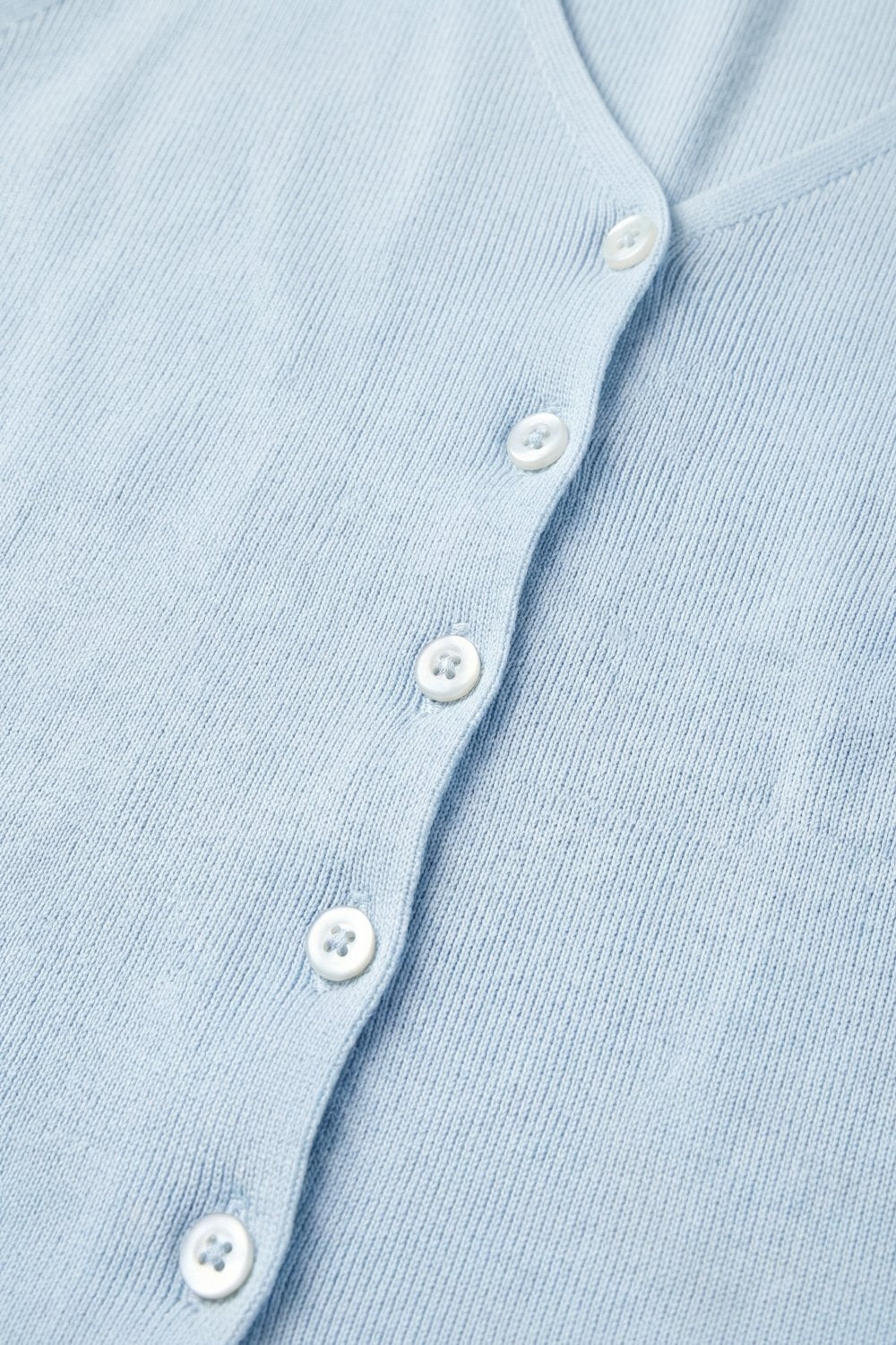 Gilet con bottoni senza maniche in maglia a coste blu chiaro
