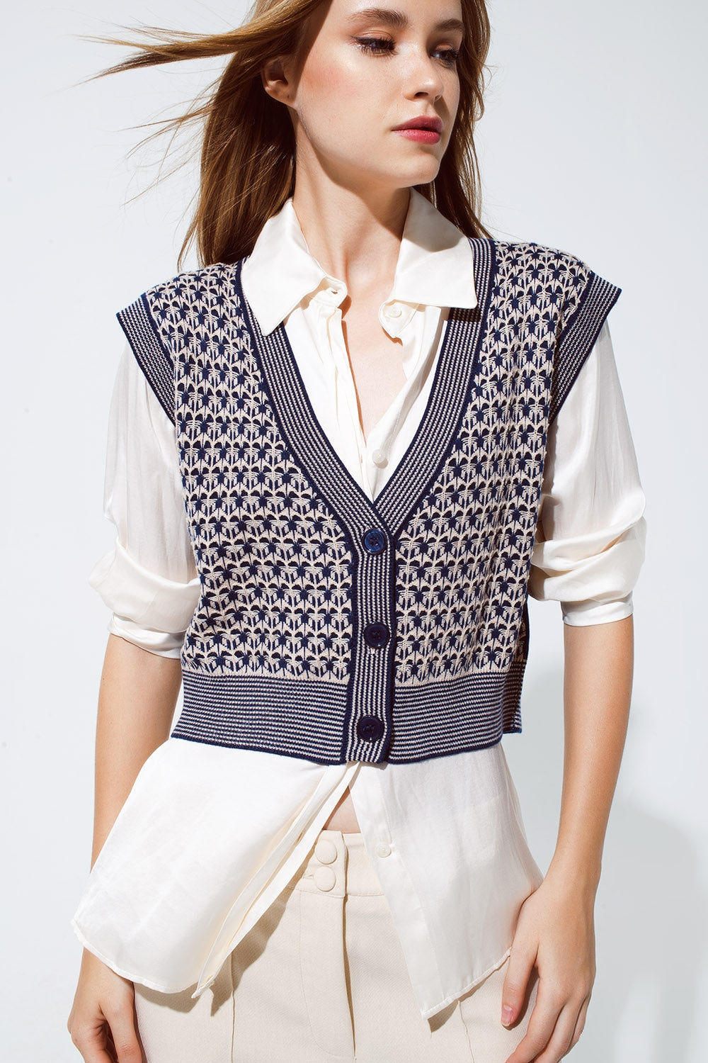 Gilet cropped in maglia con bordo a coste in blu