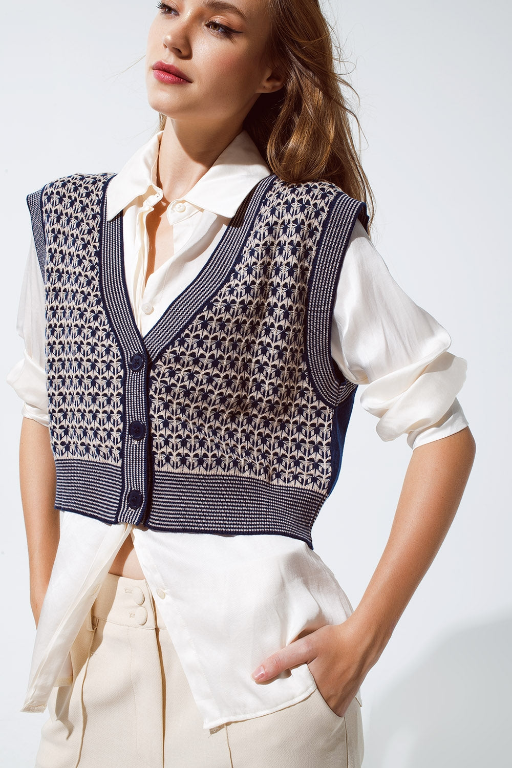 Gilet cropped in maglia con bordo a coste in blu