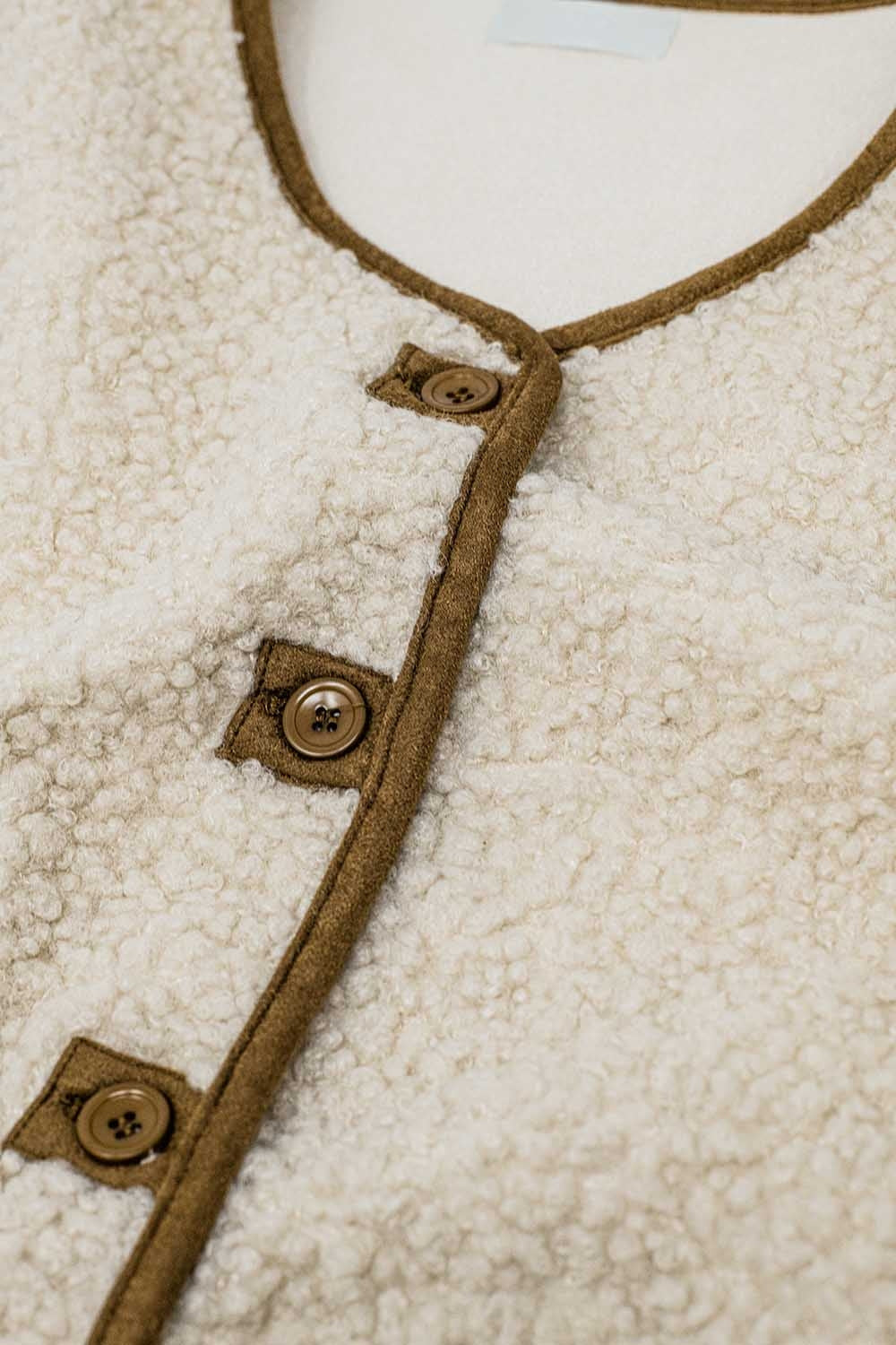 gilet di peluche in colore beige