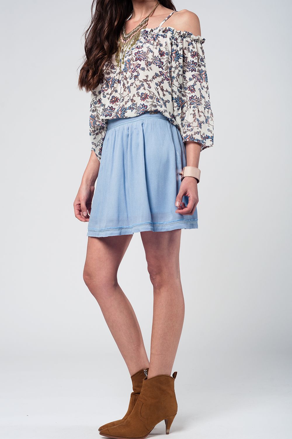 Q2 Gonna corta blu con Aztec ricamato