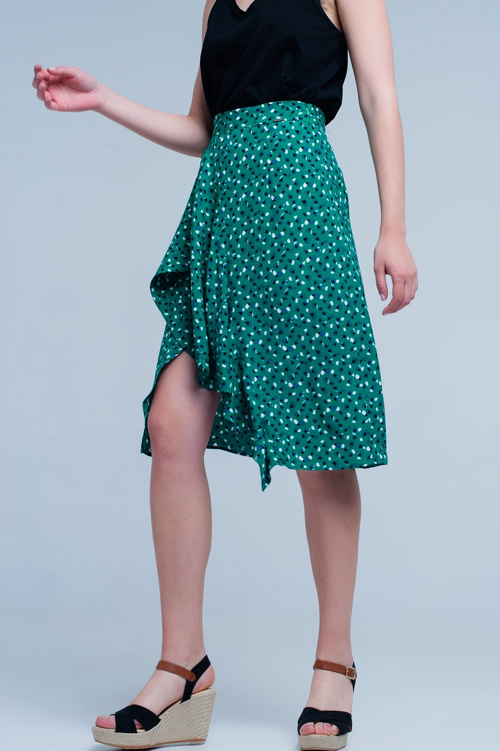Gonna midi verde con volant e stampa a pois