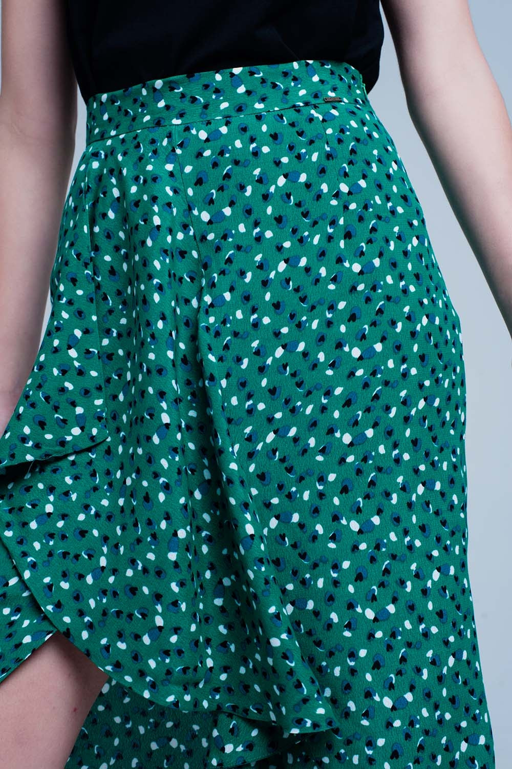 Gonna midi verde con volant e stampa a pois