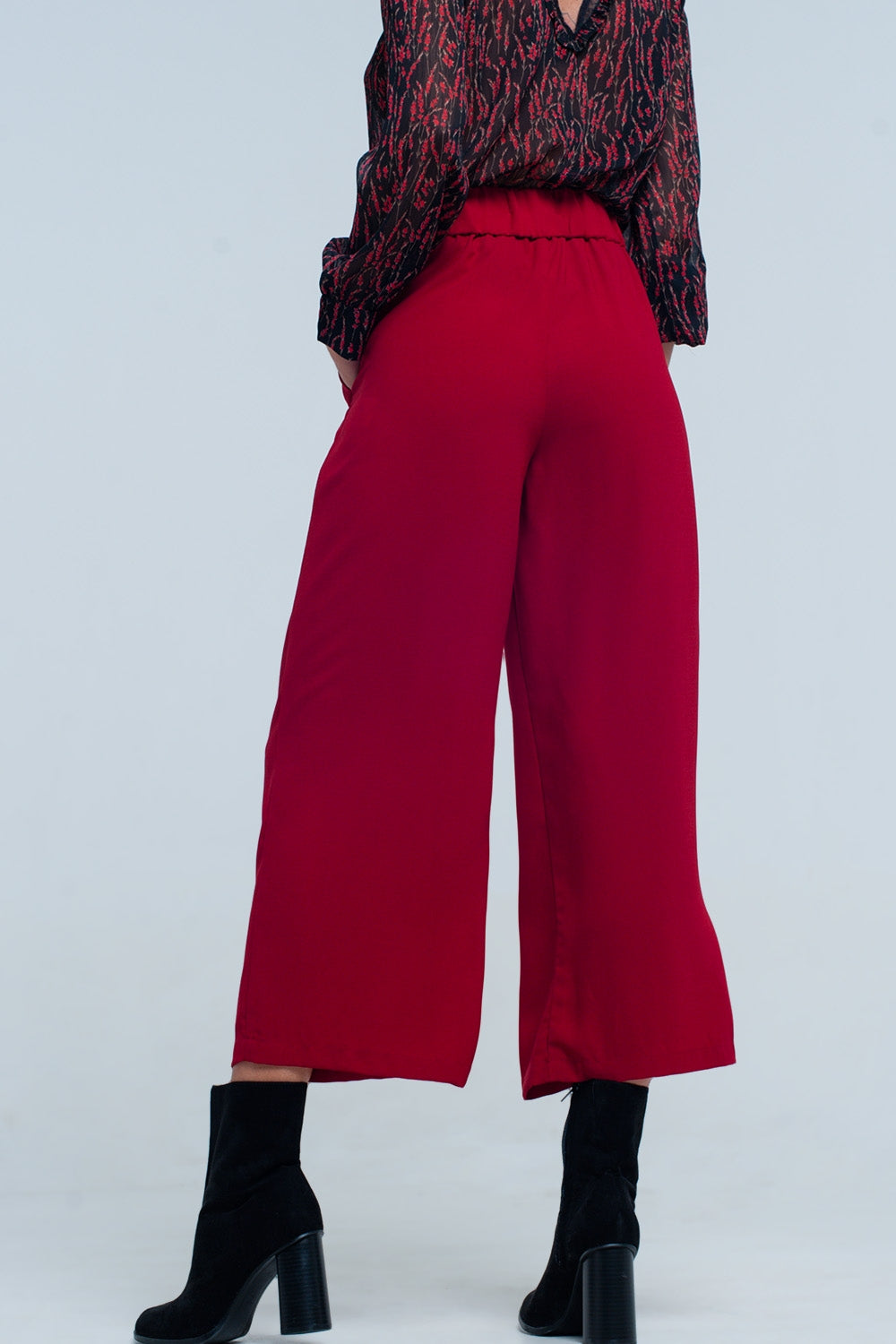 Gonna pantalone rosso con fondo ampio e Dettagli cintura