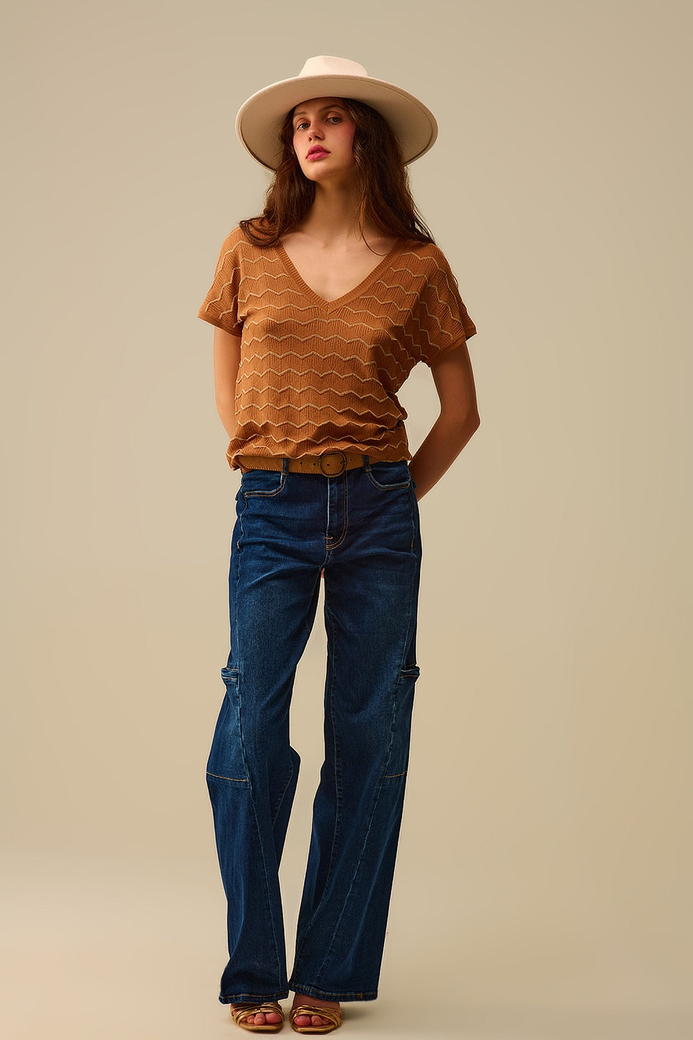 Jeans a vita alta a gamba larga con tasche laterali