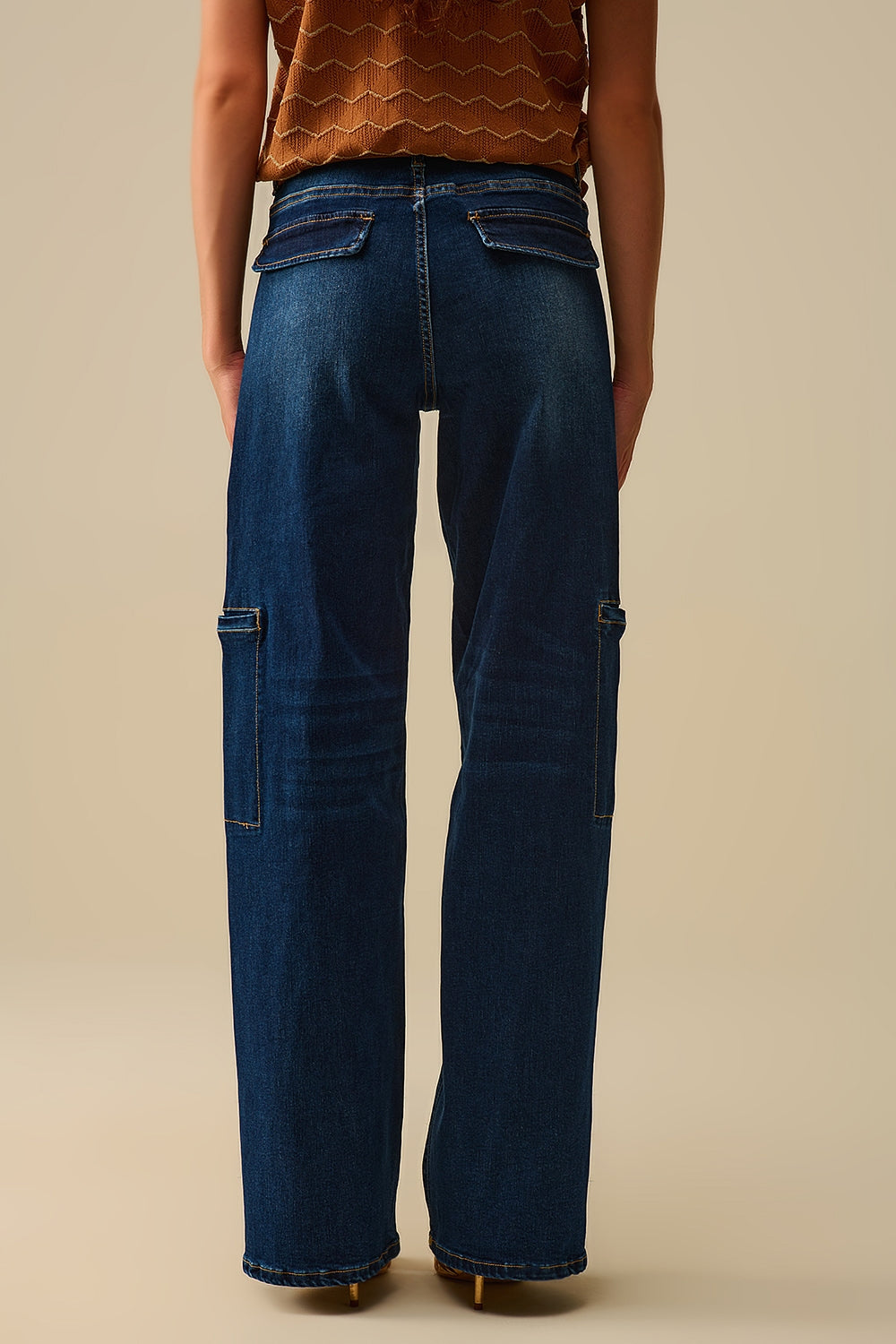 Jeans a vita alta a gamba larga con tasche laterali