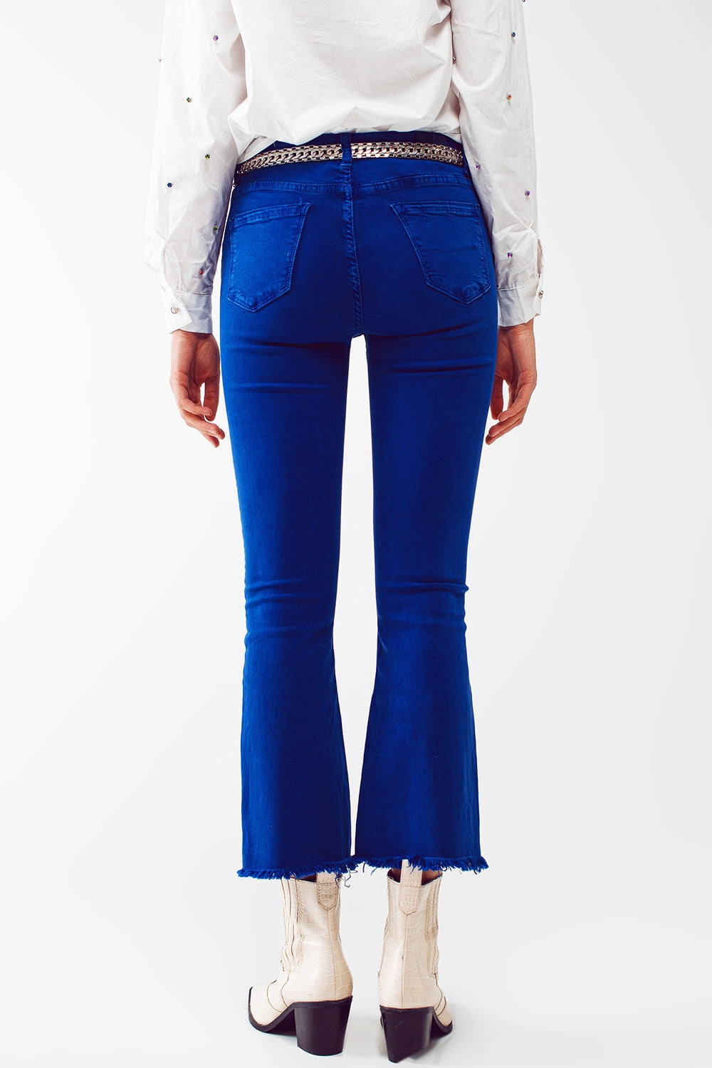 Jeans a zampa blu con orlo grezzo