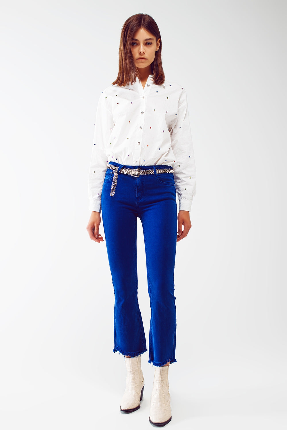 Jeans a zampa blu con orlo grezzo