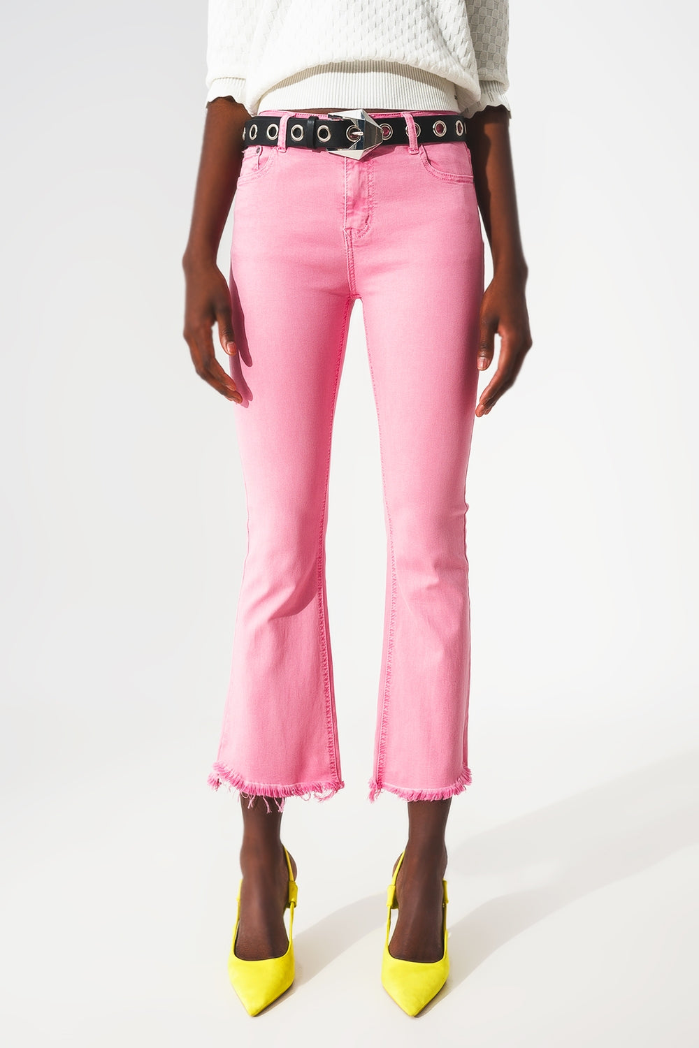 Jeans a zampa con orlo grezzo in rosa bubblegum