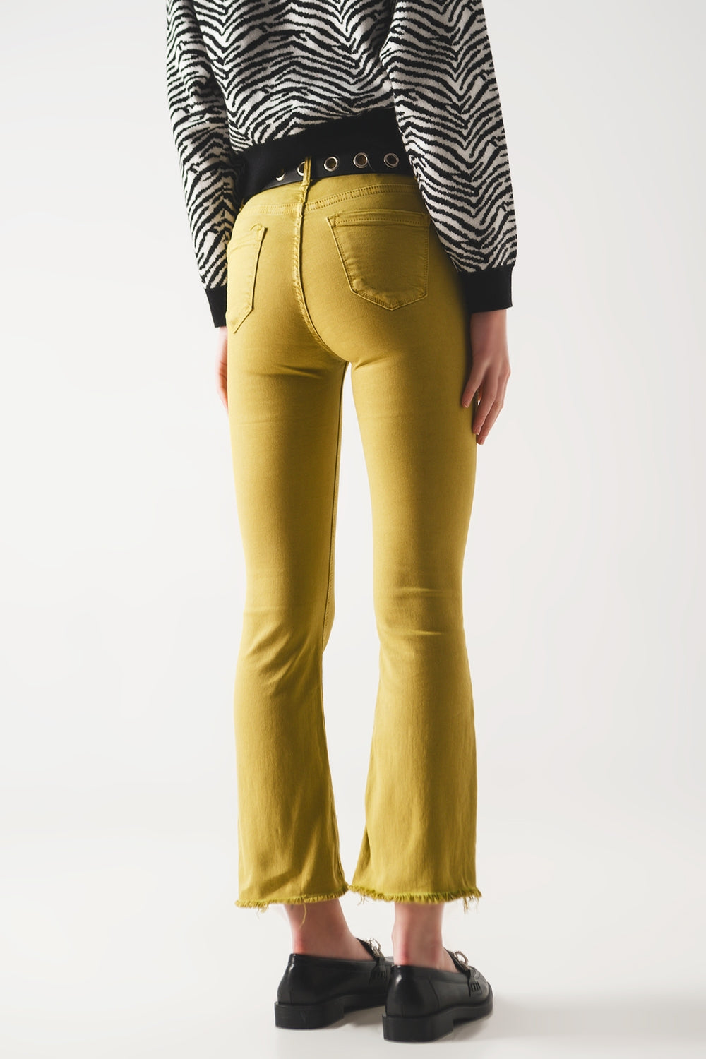 Jeans a zampa verdi con orlo grezzo