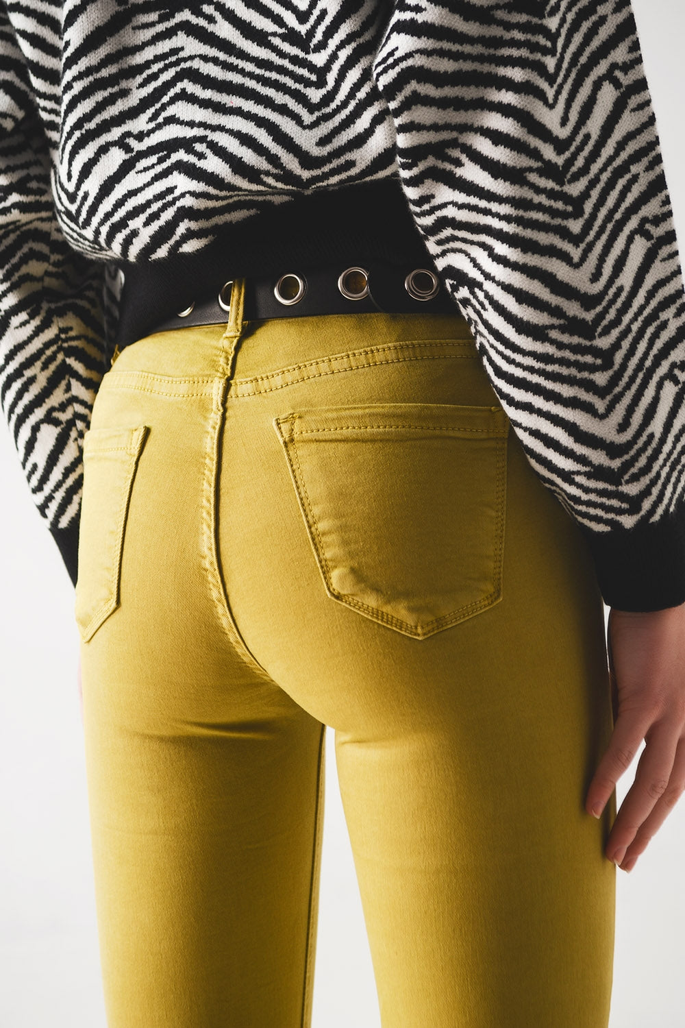 Jeans a zampa verdi con orlo grezzo