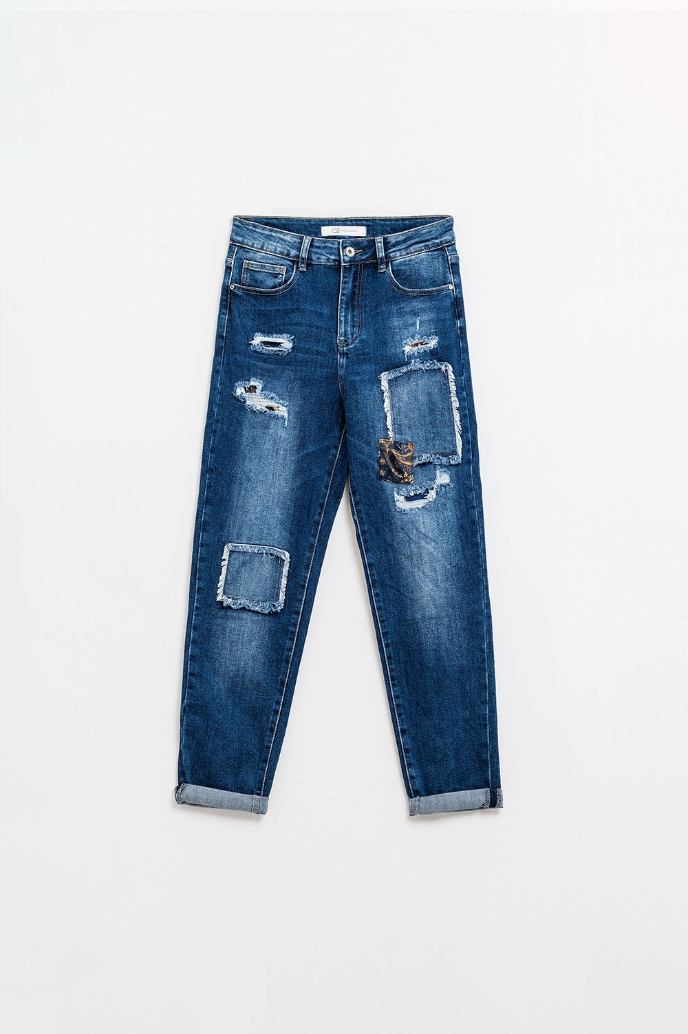 Jeans blu larghi con sottili strappi e toppe