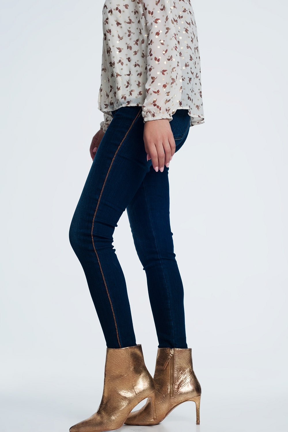 Jeans con dettagli laterali dorati