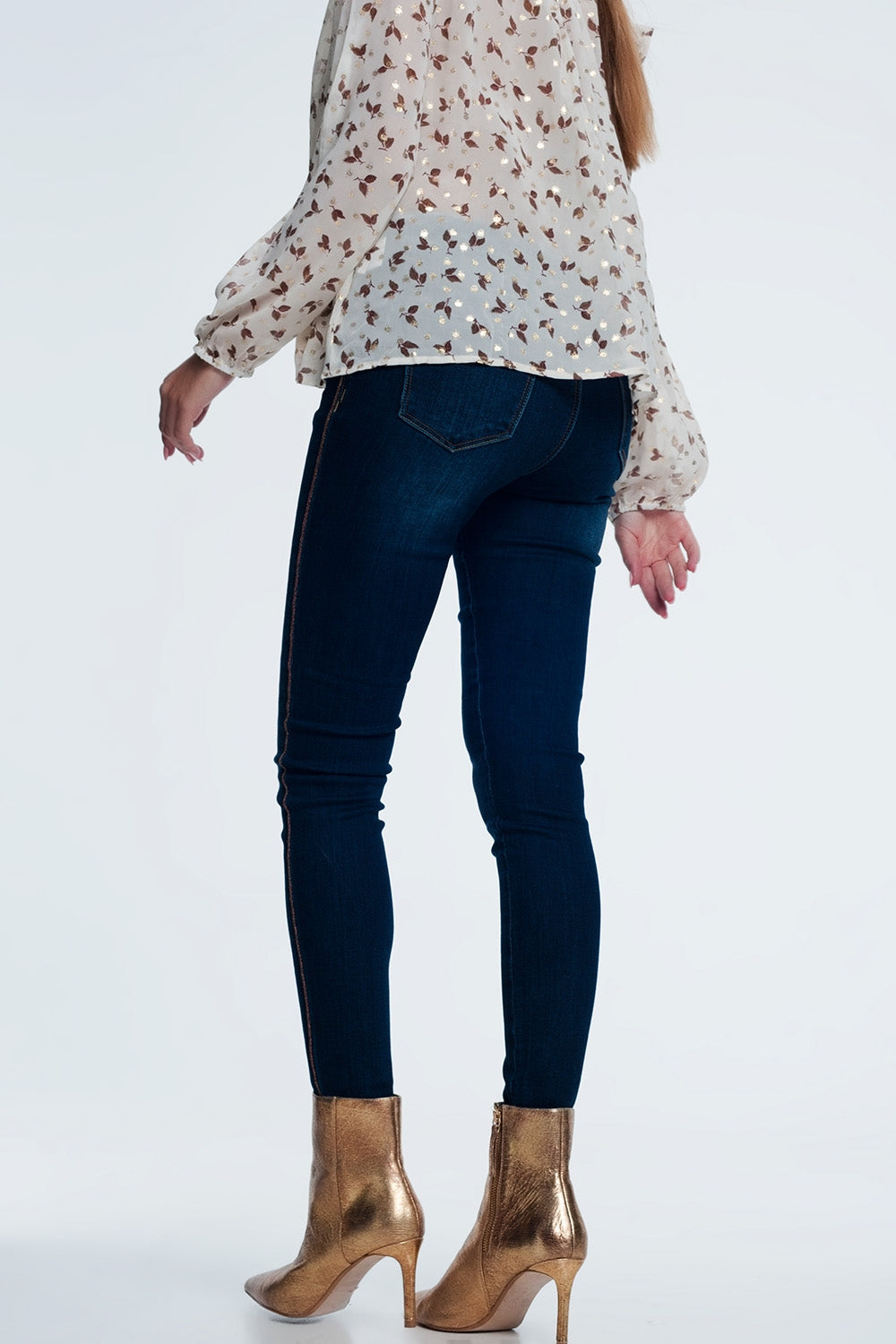 Jeans con dettagli laterali dorati