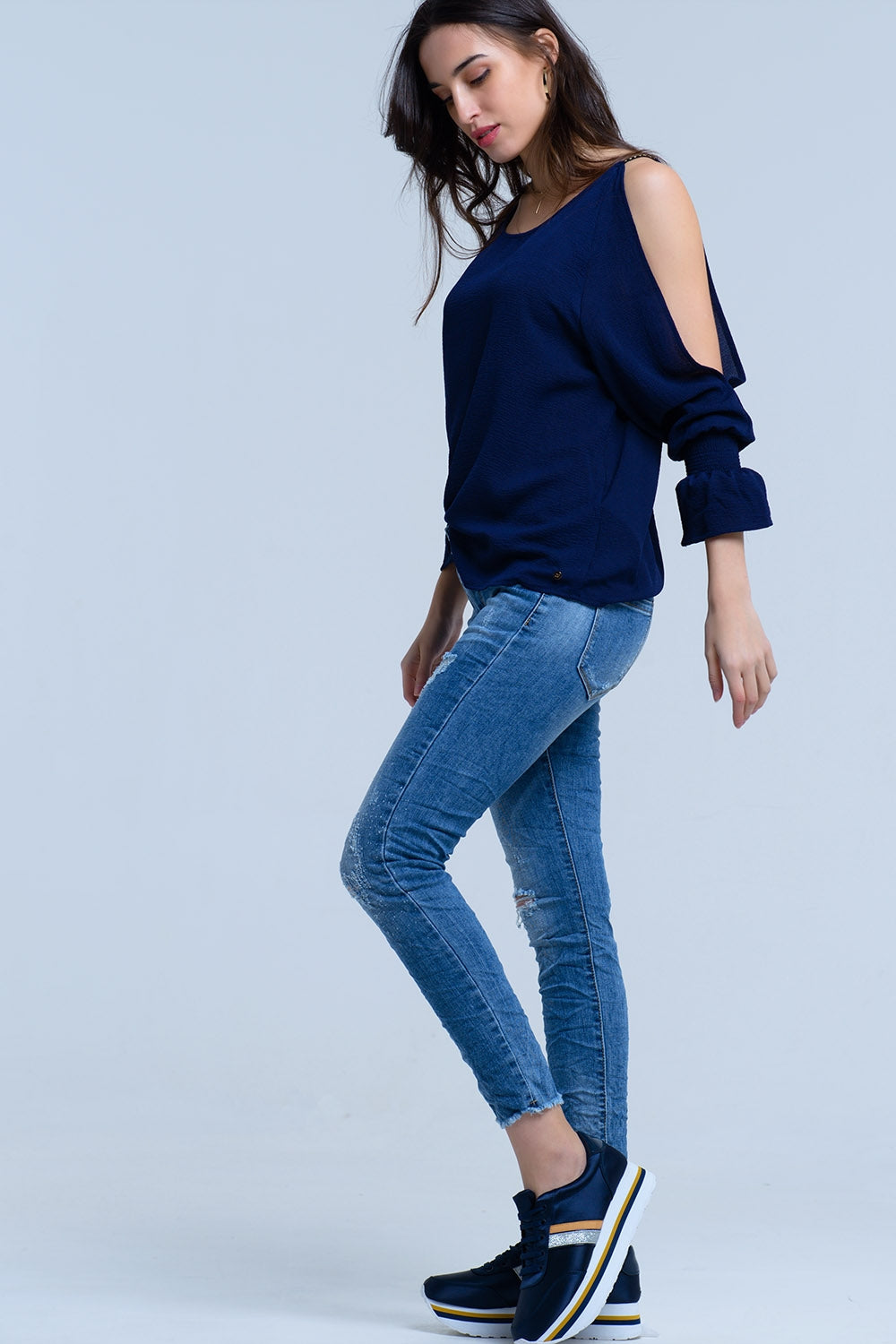 Jeans con dettagli strappati