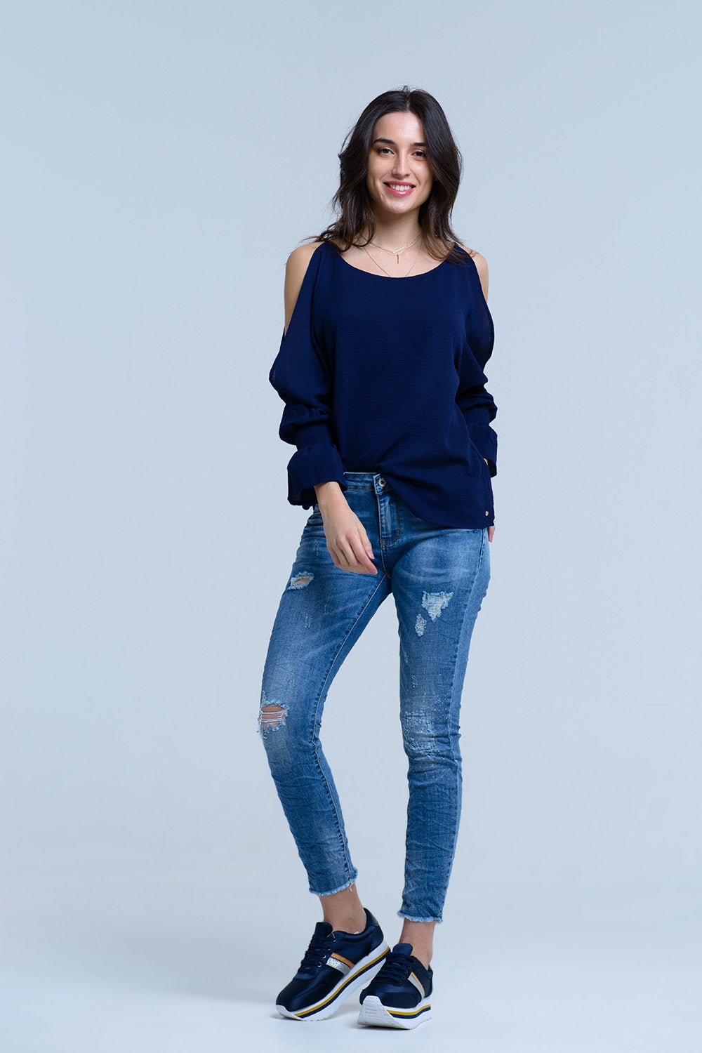 Jeans con dettagli strappati