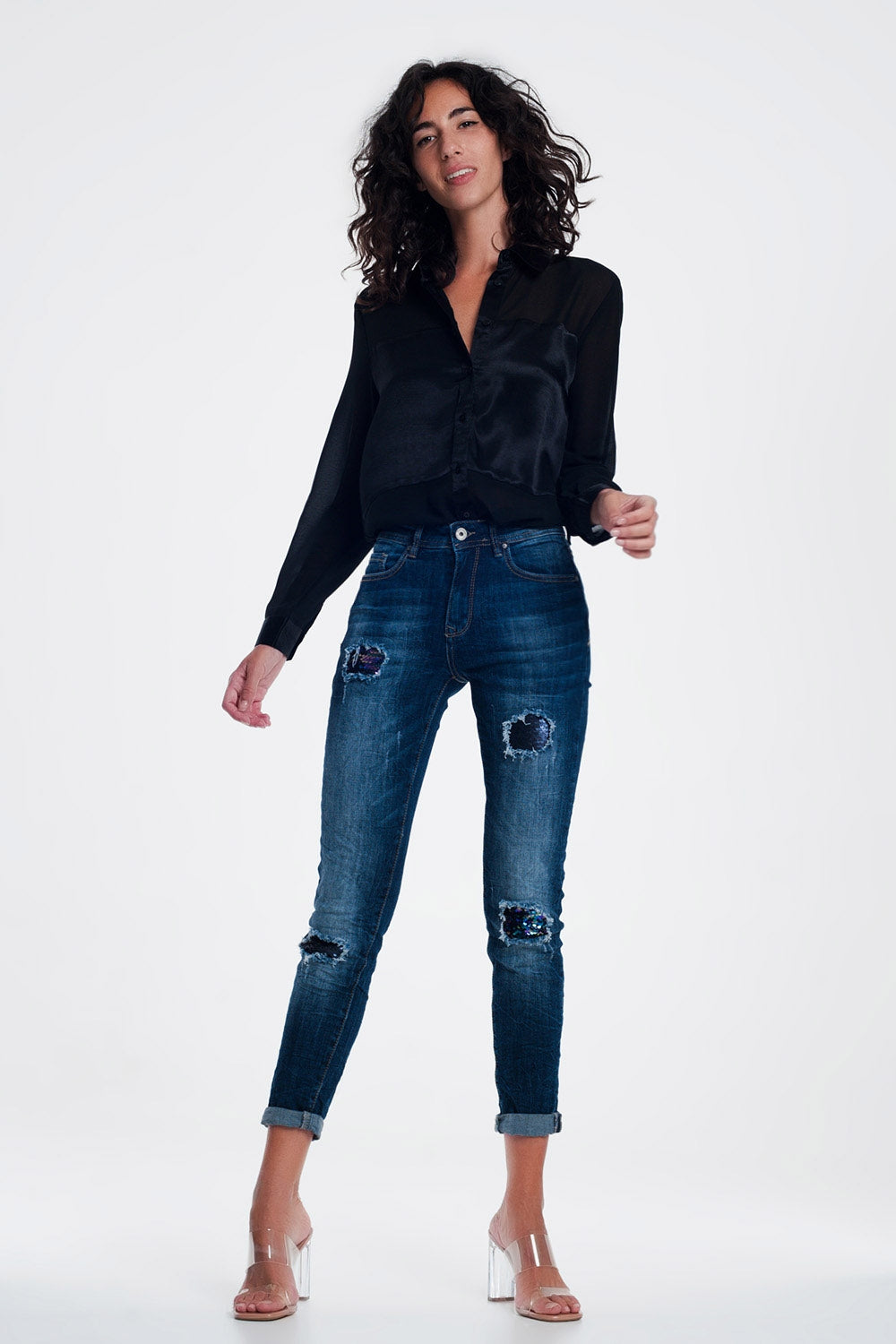 jeans con paillettes e strappi