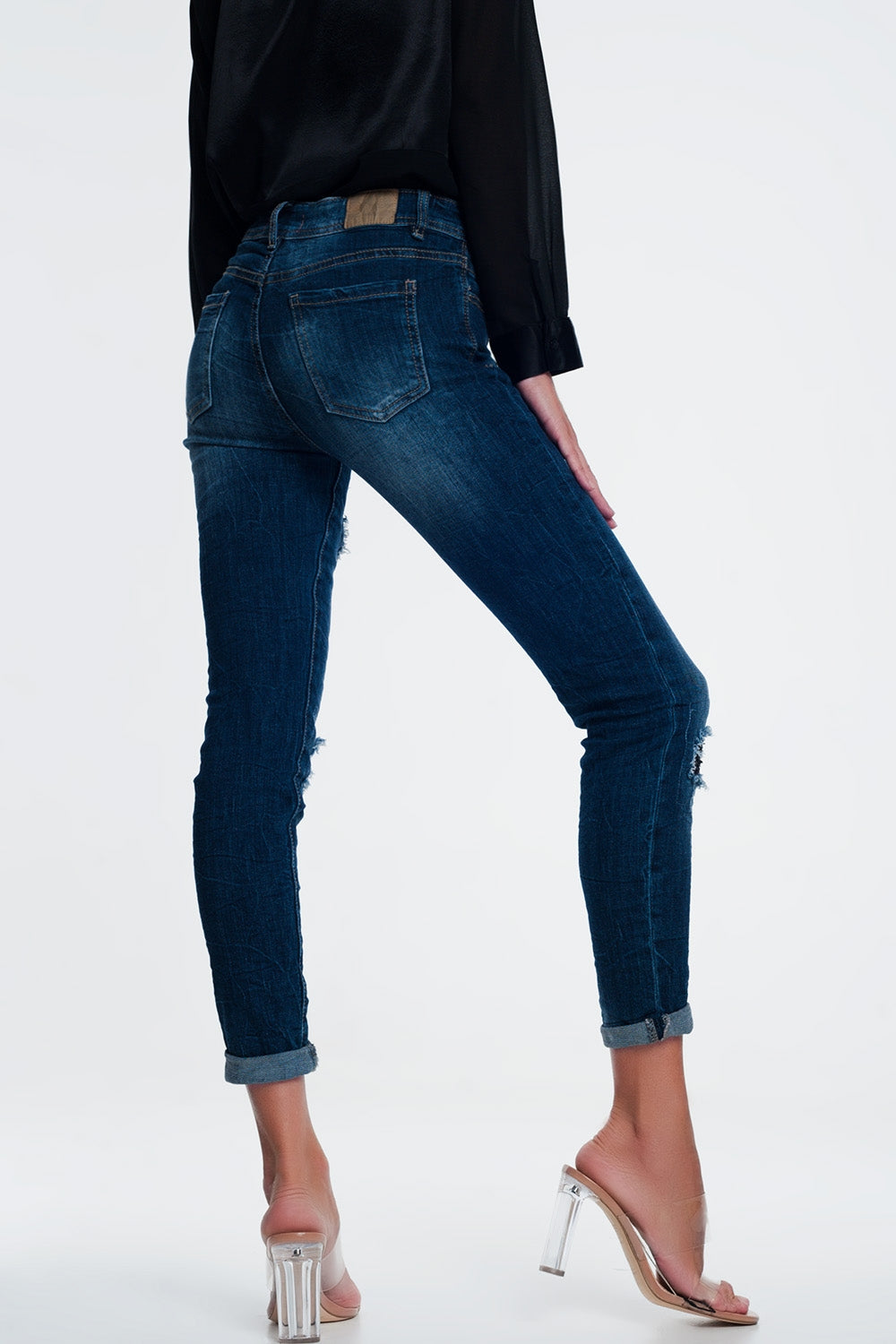 jeans con paillettes e strappi