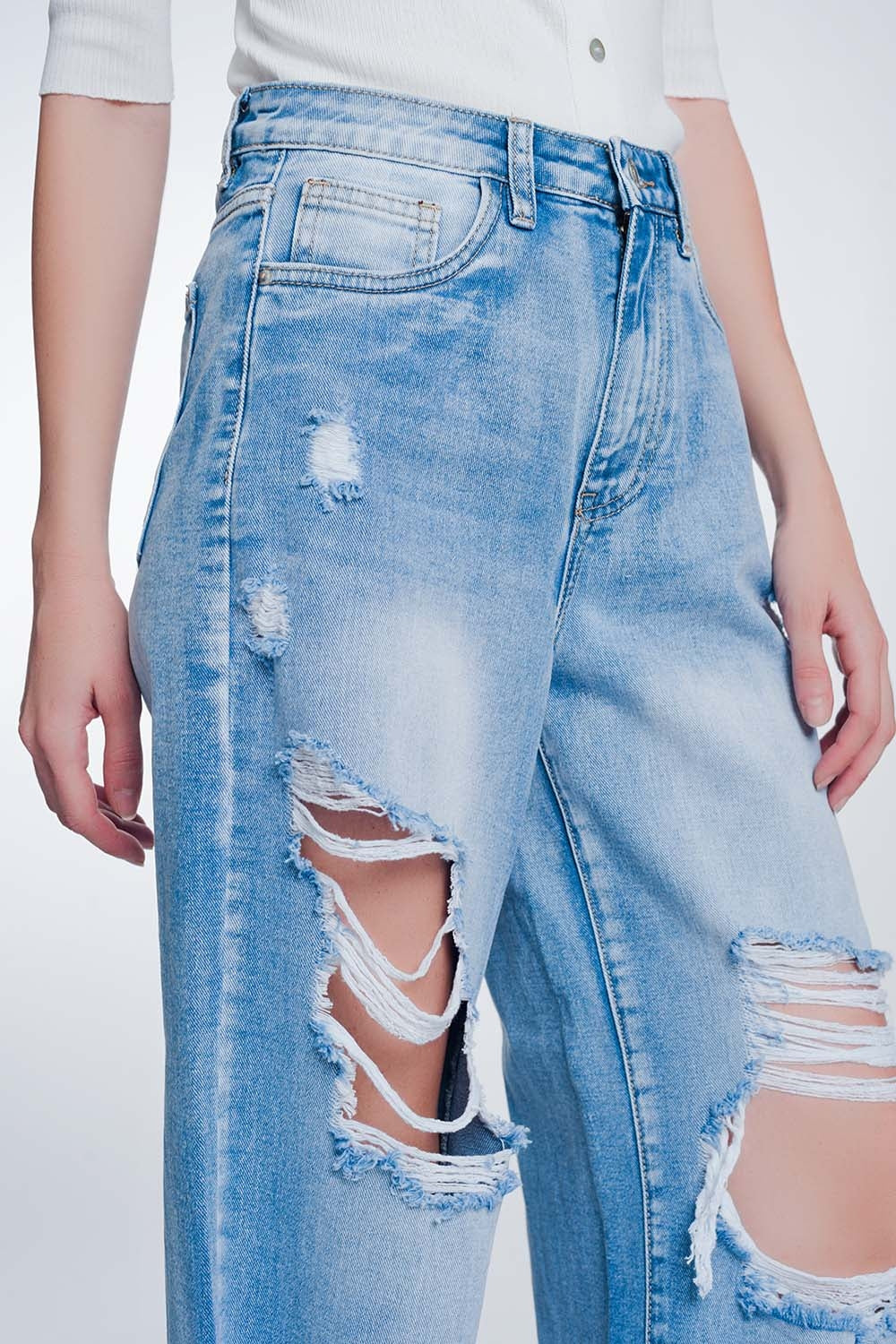 Jeans cropped con fondo ampio e grezzo azzurri
