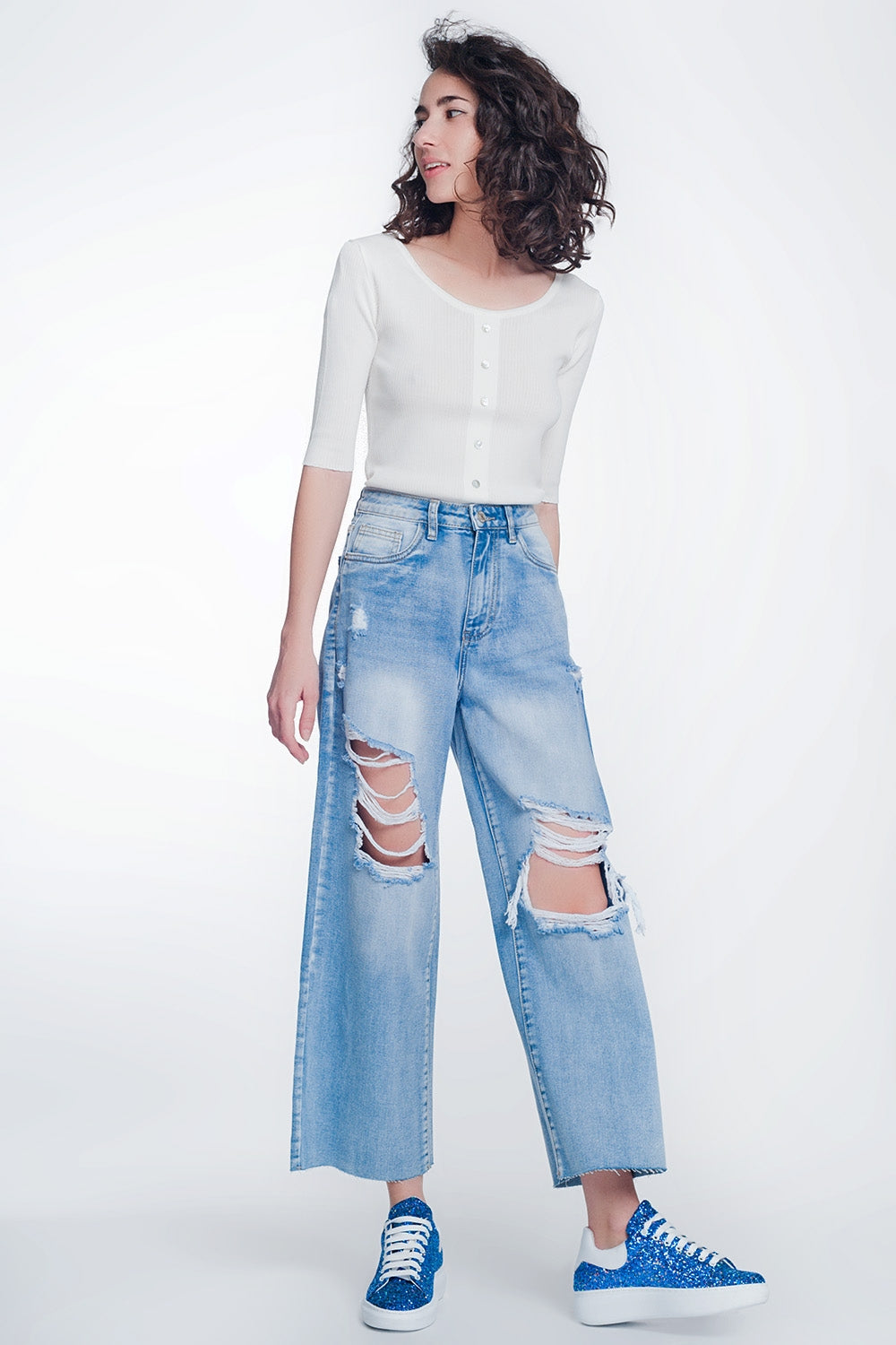 Jeans cropped con fondo ampio e grezzo azzurri