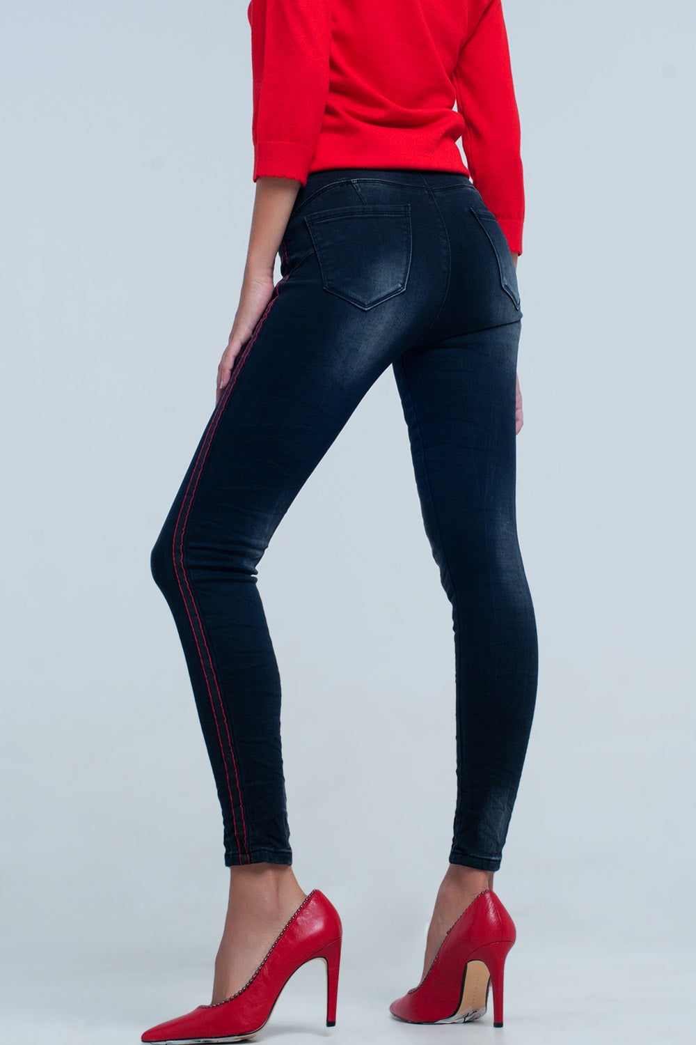 Jeans nero skinny con righe laterali