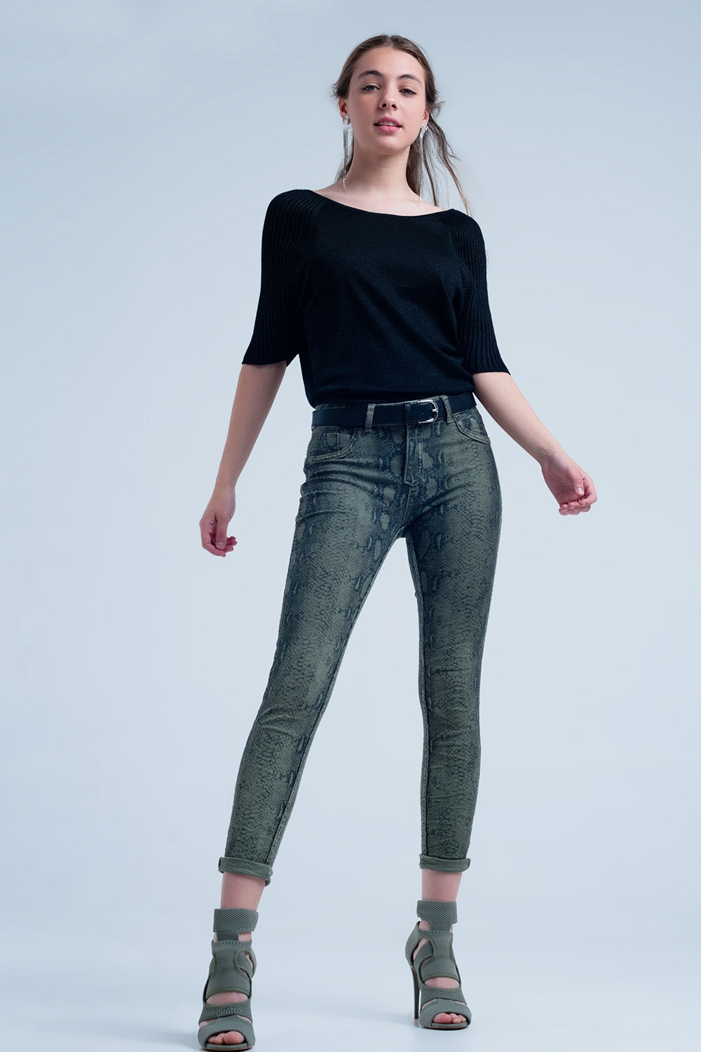 Jeans reversibile verdi con stampa a serpente