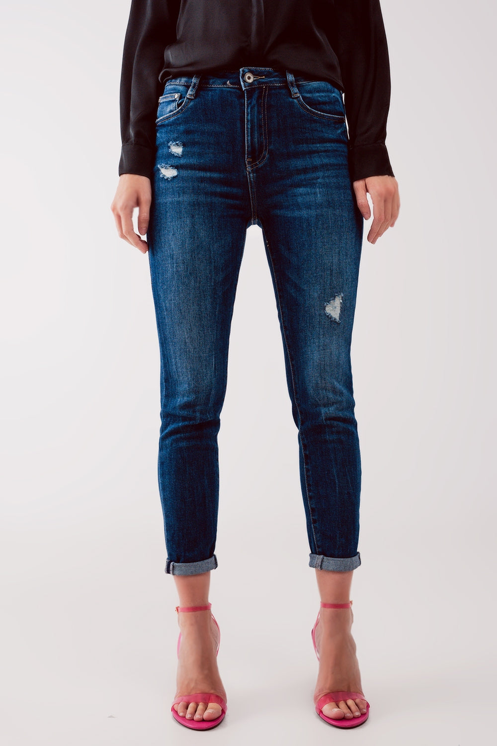 Jeans skinny a vita alta blu lavaggio medio con strappi