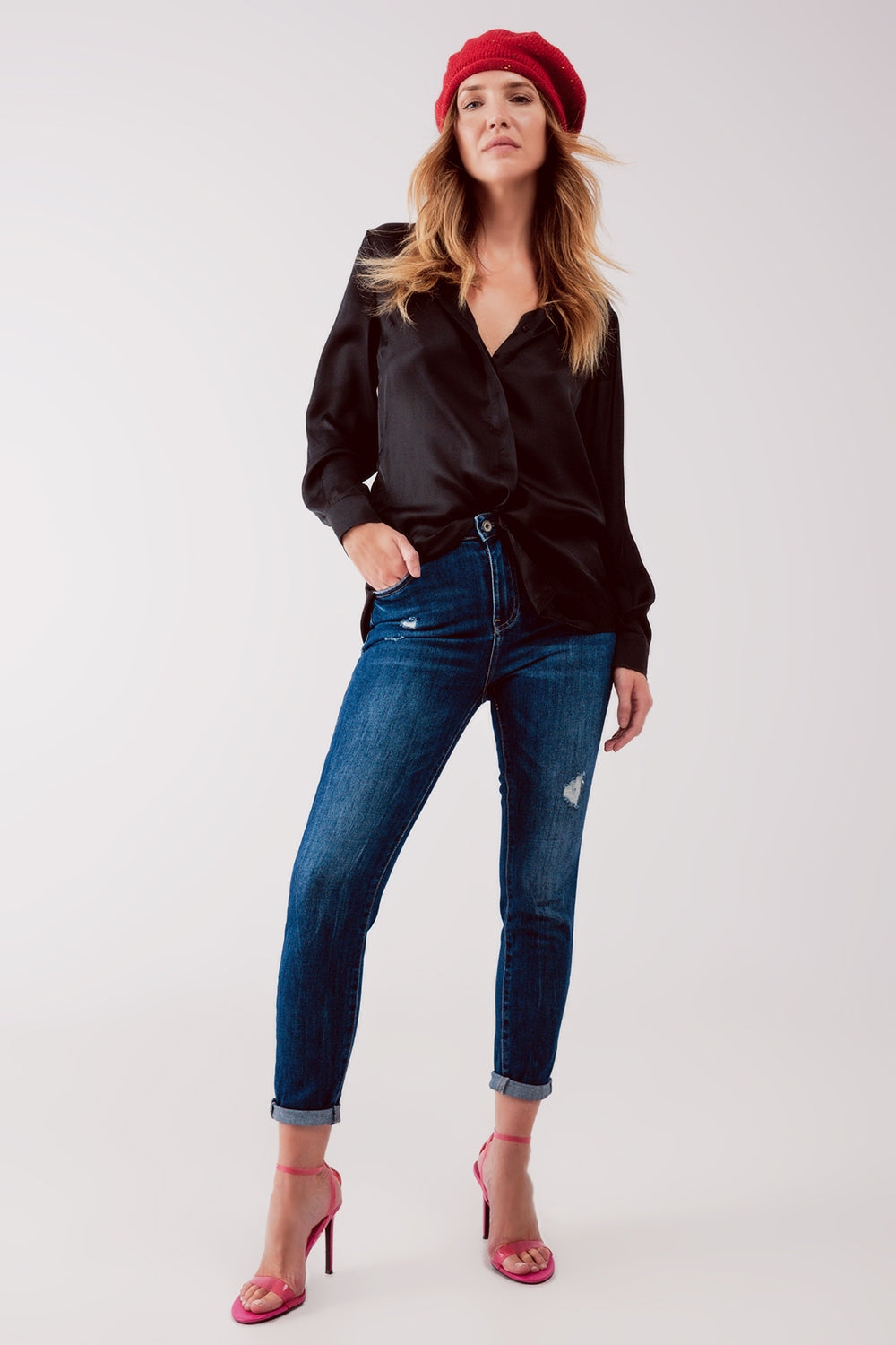 Jeans skinny a vita alta blu lavaggio medio con strappi